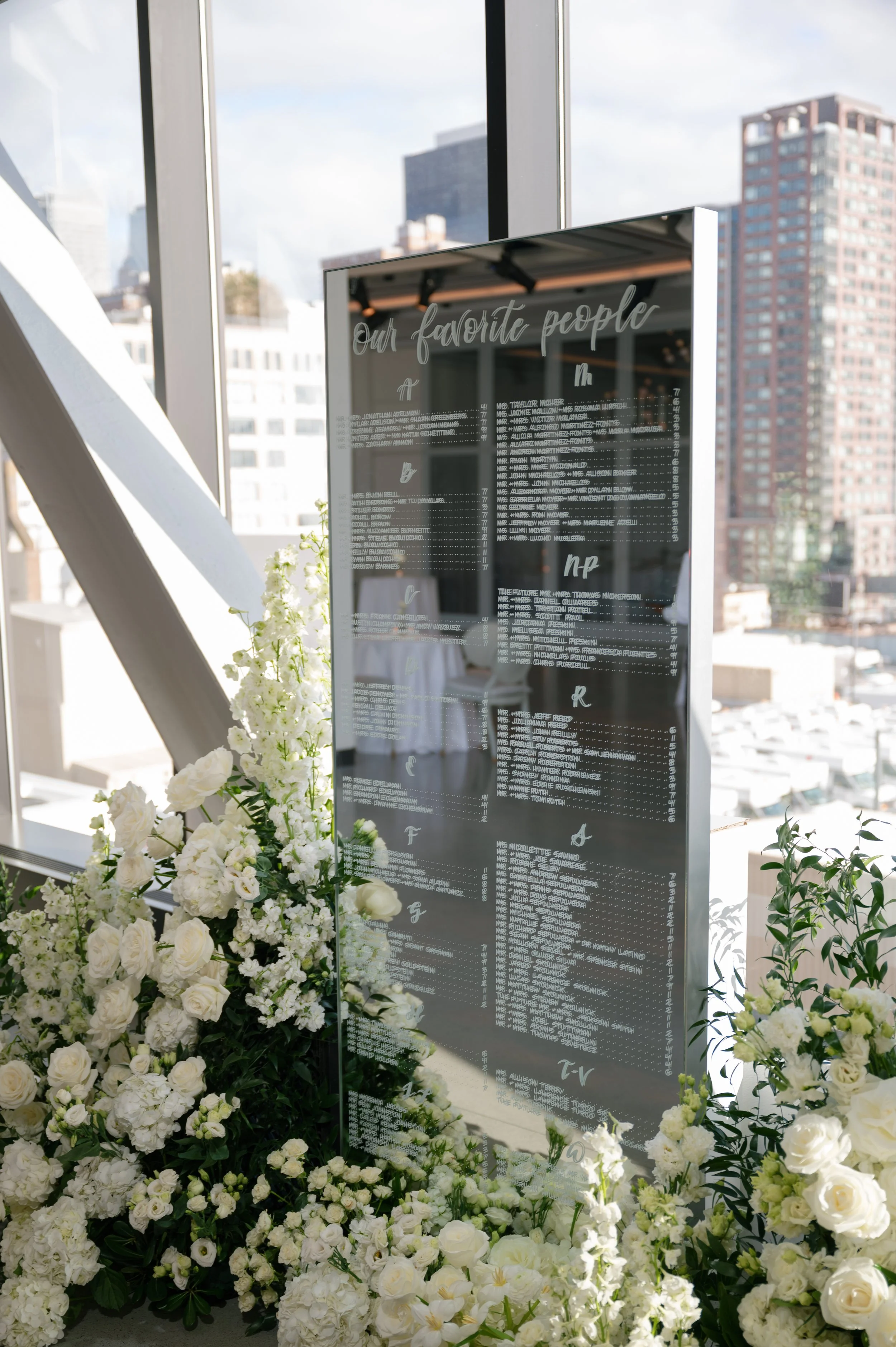 Large scale modern calligraphy mirror seating chart in NYC
