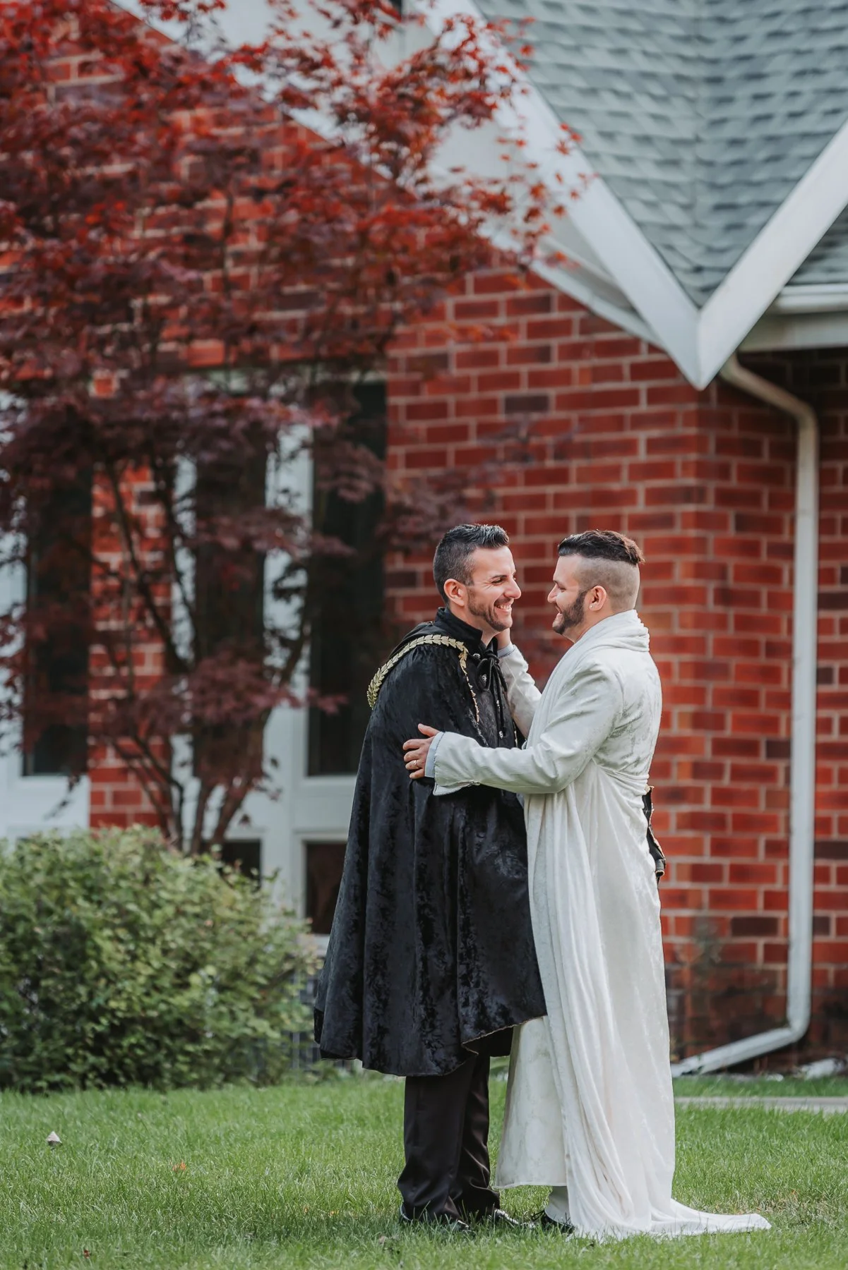 Upstate New York LGBT wedding couple embracing after a first look