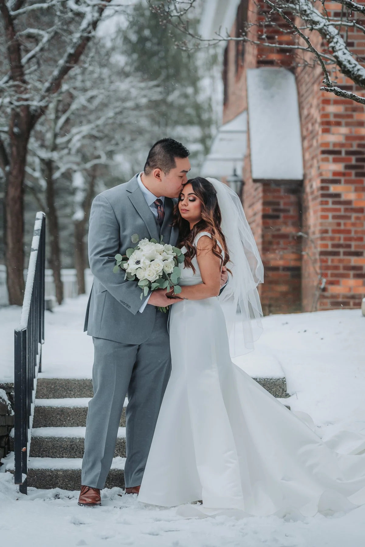 Upstate New York wedding interracial couple in the snow