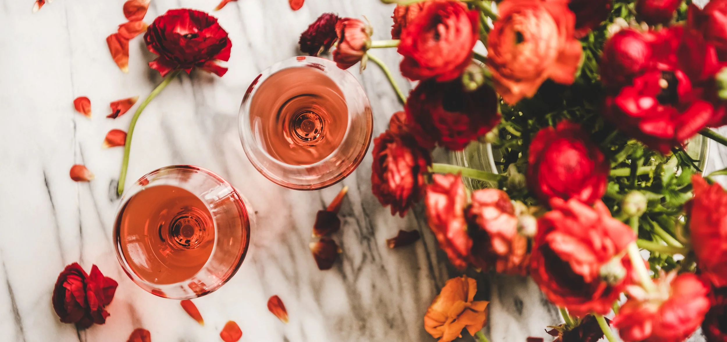 rose-wine-in-glasses-and-red-spring-flowers-wide-2026-01-05-05-52-59-utc.jpg