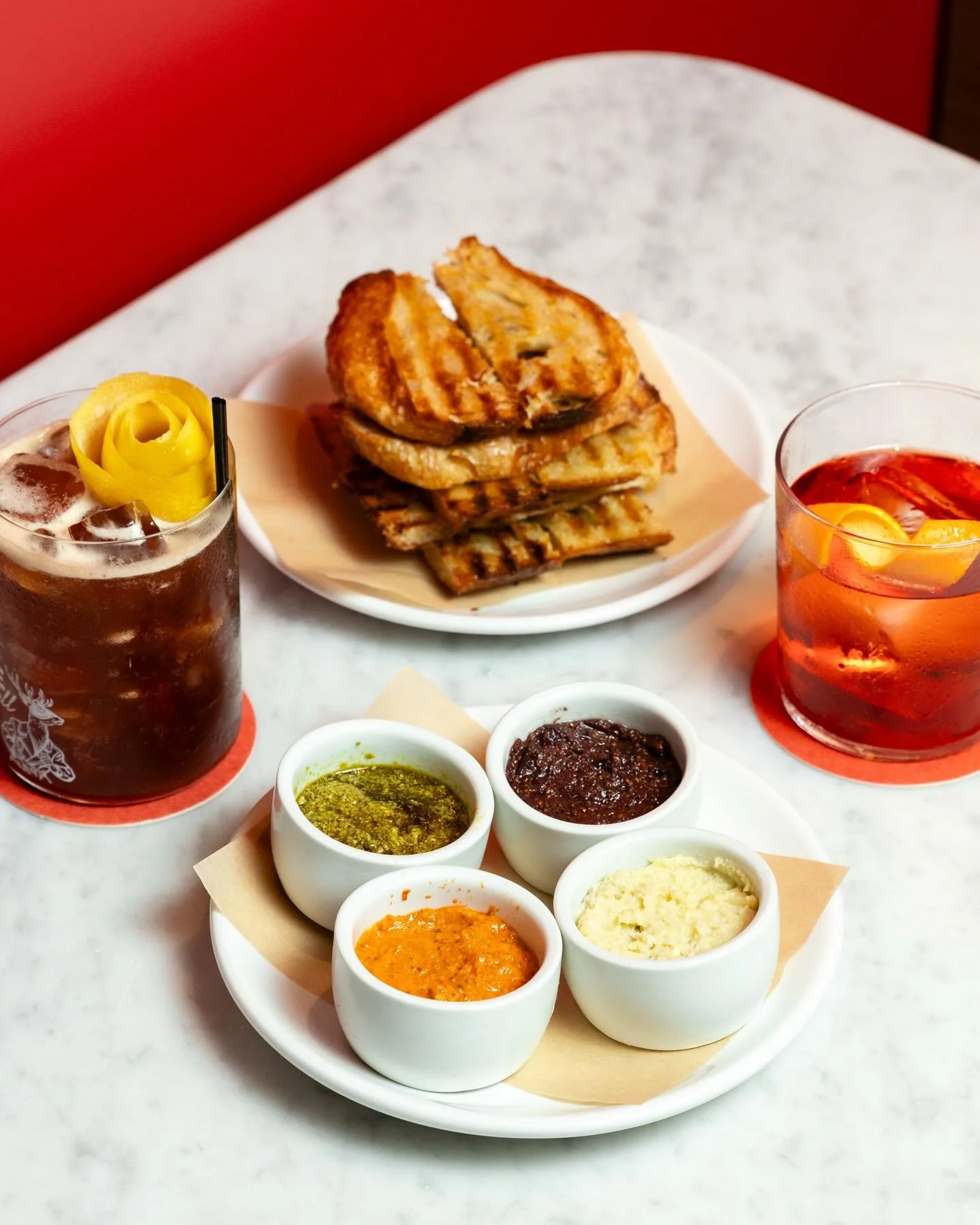 Pane Bianco &amp; Condimenti, your bestie, and a cocktail &mdash; sounds like the perfect weekend trio! 🥂✨🥖

See ya tonight &mdash; we open at 5p! 

#redroomfresno #craftcocktails #fresnohappyhour 

Be sure to check our website for closures due to 