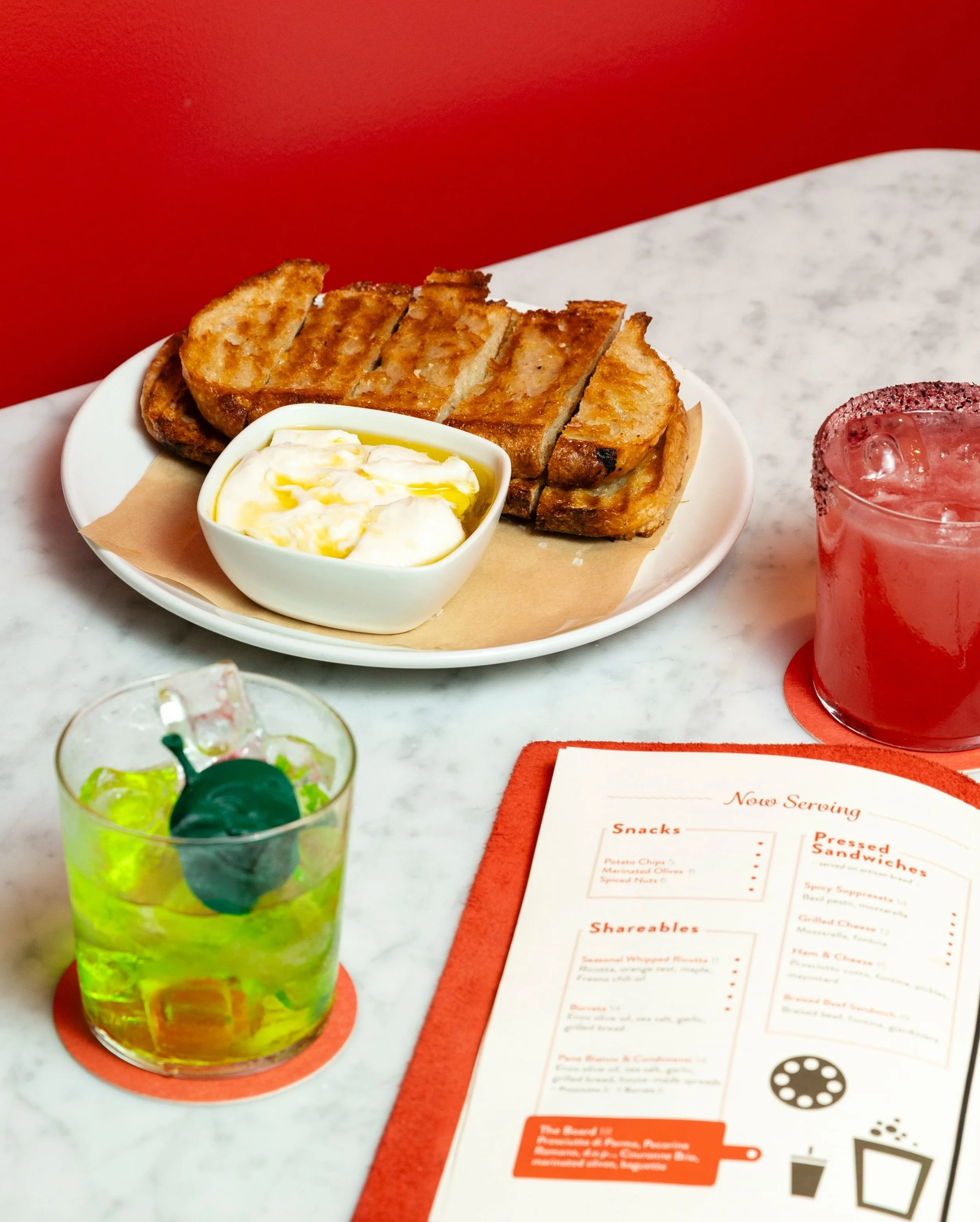 BURRATA &mdash; 
Enzo olive oil, sea salt, grilled bread 

Pair it with a cocktail, or two 🥂

Be sure to check our website calendar weekly for closures due to private events! 

#redroomfresno #craftcocktails