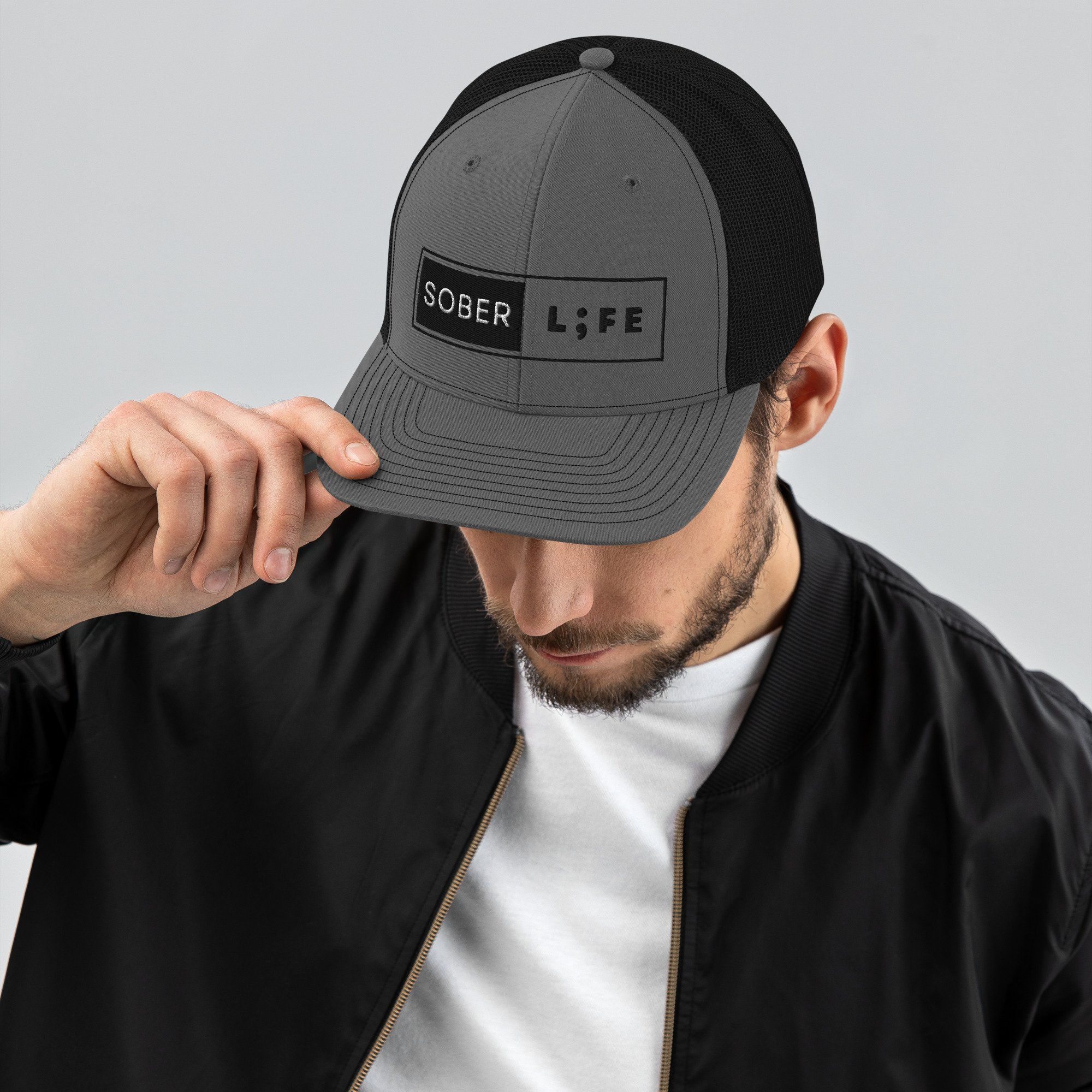 snapback-trucker-cap-charcoal-black-front-64fe85e4561f1.jpg