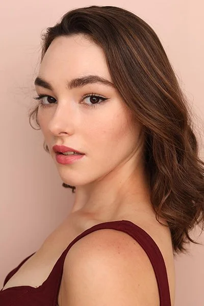 A headshot of Mackenzie - Video Editor