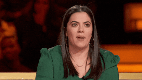 Animated GIF of a woman on a game show saying I'M SO READY