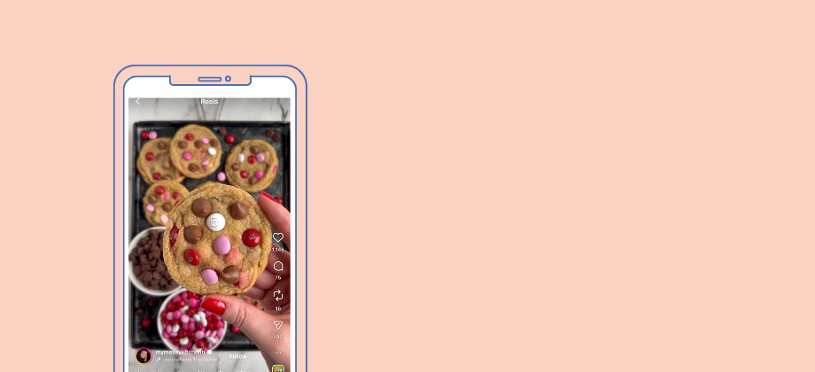 Image is of a phone with a screenshot of valentine's day cookies in the middle