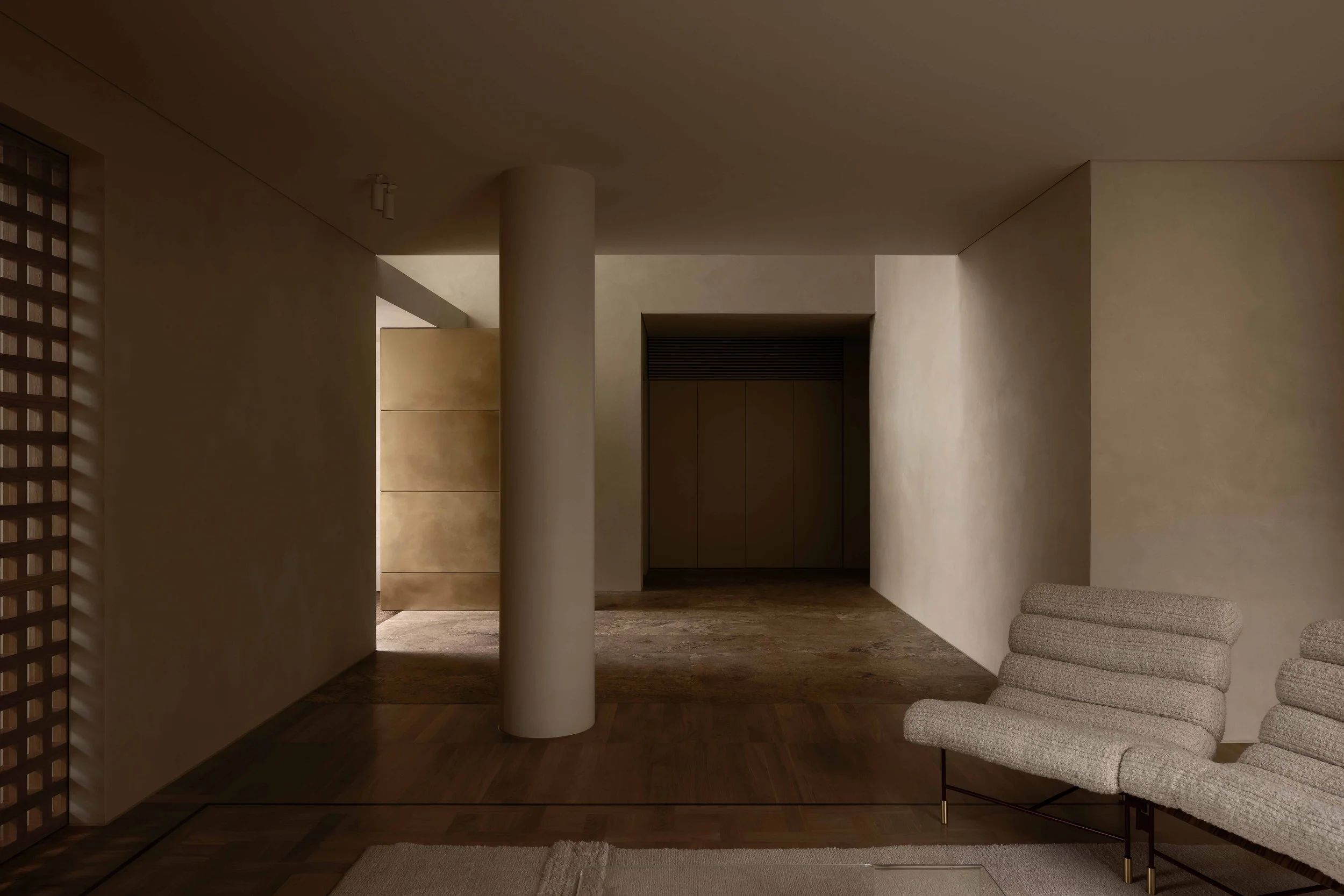 Warm minimalist entry at LDS II Residence.