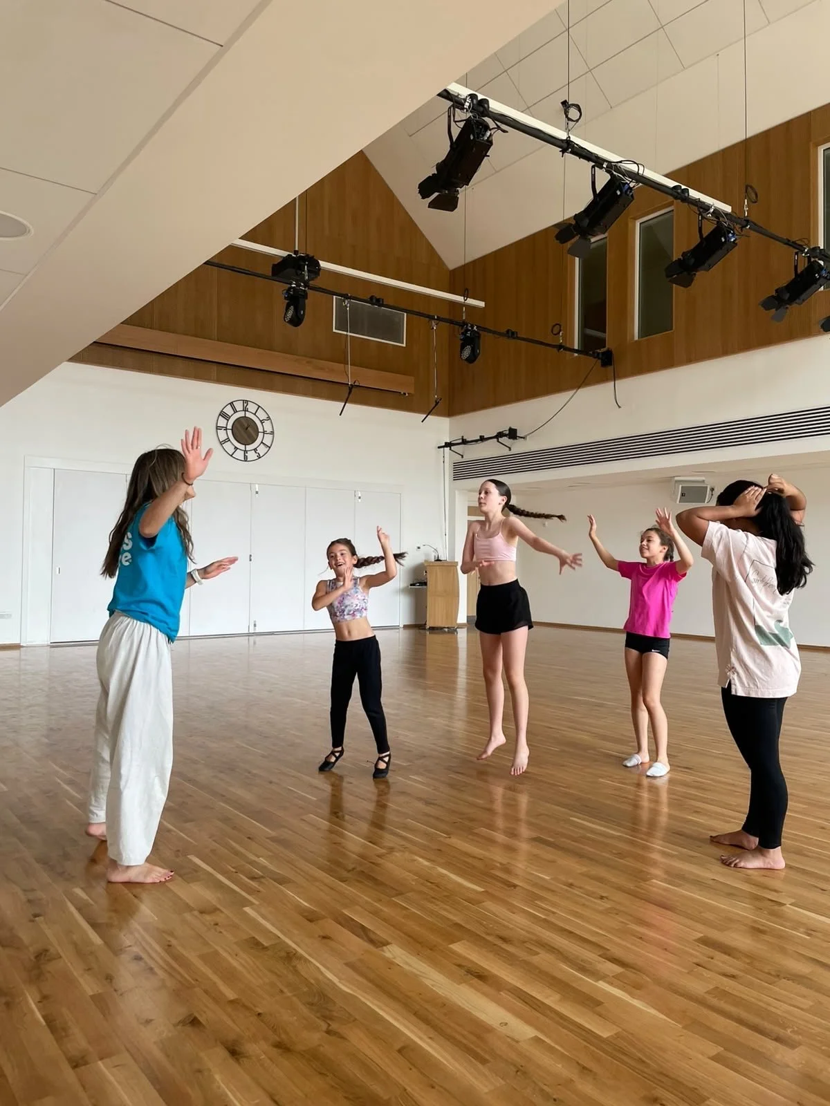 teesdance-summer-school-2026-06-group-movement-arms-raised.jpg