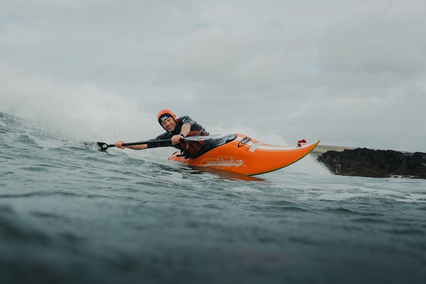 Simon Hammond in our orange and yellow surf lid! Simon is hosting a Bude Surf Kayaking Bonanza!

1st and 2nd July - Surf Kayaking Skills weekend
3rd and 4th July - How to Lead others in the Surf
Come to Bude, the home of Surf Kayaking in the UK, to l