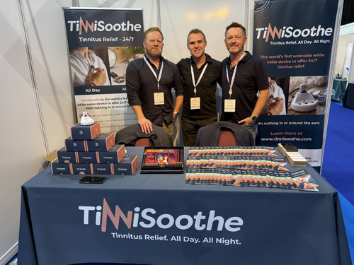 The TinniSoothe team at an exhibition stand