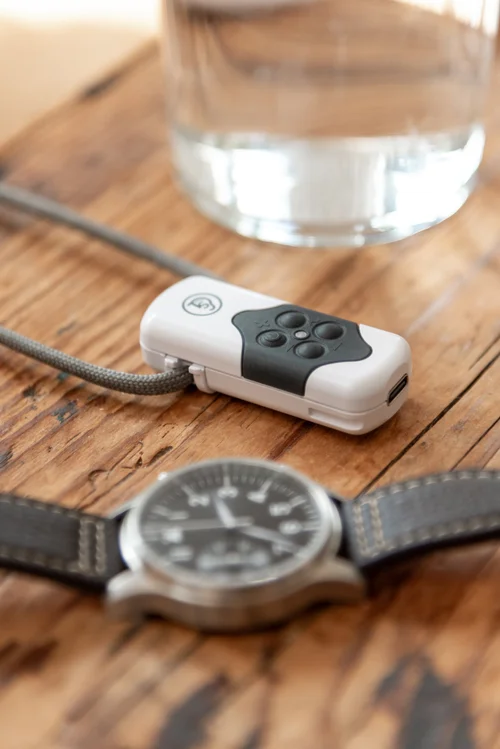 TinniSoothe wearable sound therapy device shown at scale