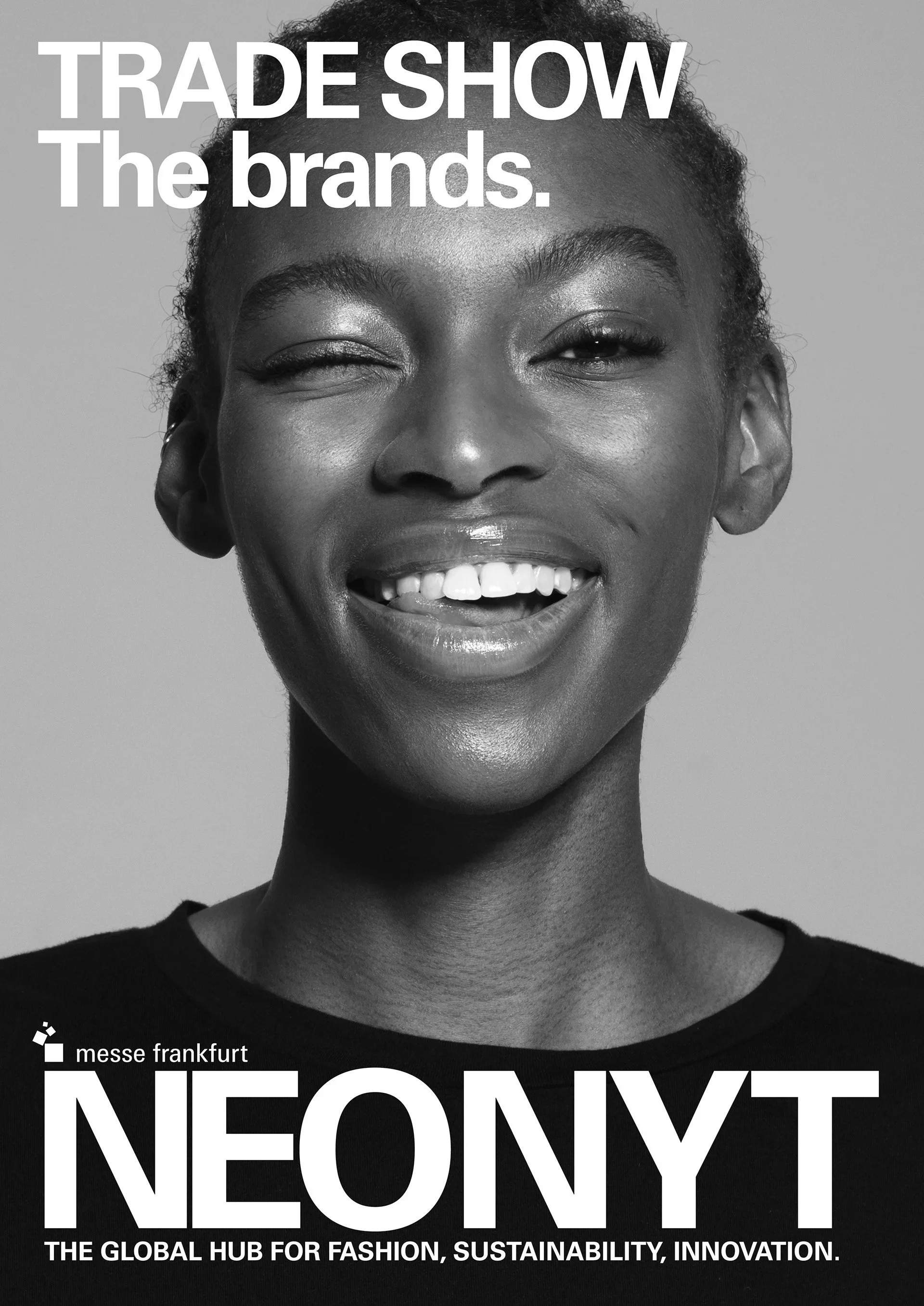 Black and white advertisement featuring a smiling woman with short hair, promoting trade shows and brands with the text 'Trade Show, The brands' and 'NEONYT, The Global Hub for Fashion, Sustainability, Innovation'.