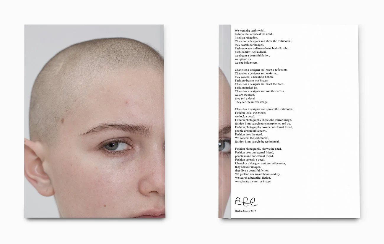 A person with a shaven head and light skin, focusing on the left side of the face, next to a page of printed text.