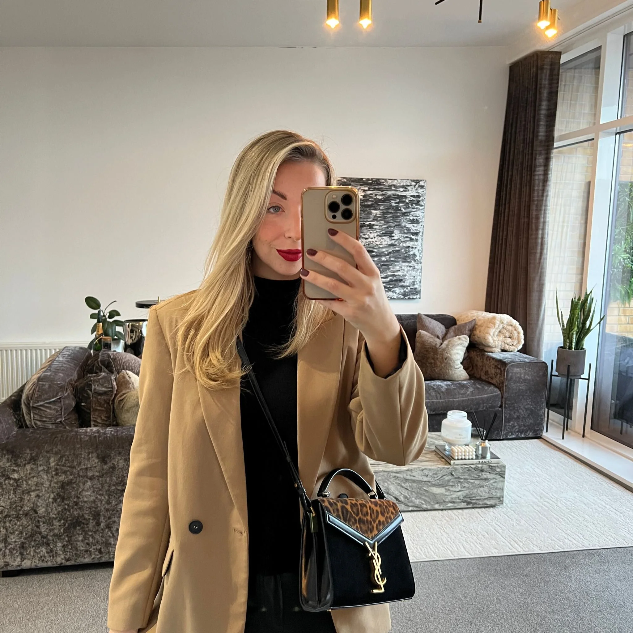 Saint Laurent YSL Cassandra Mini Top Handle Bag in Black / Leopard print Suede and Leather shown on model