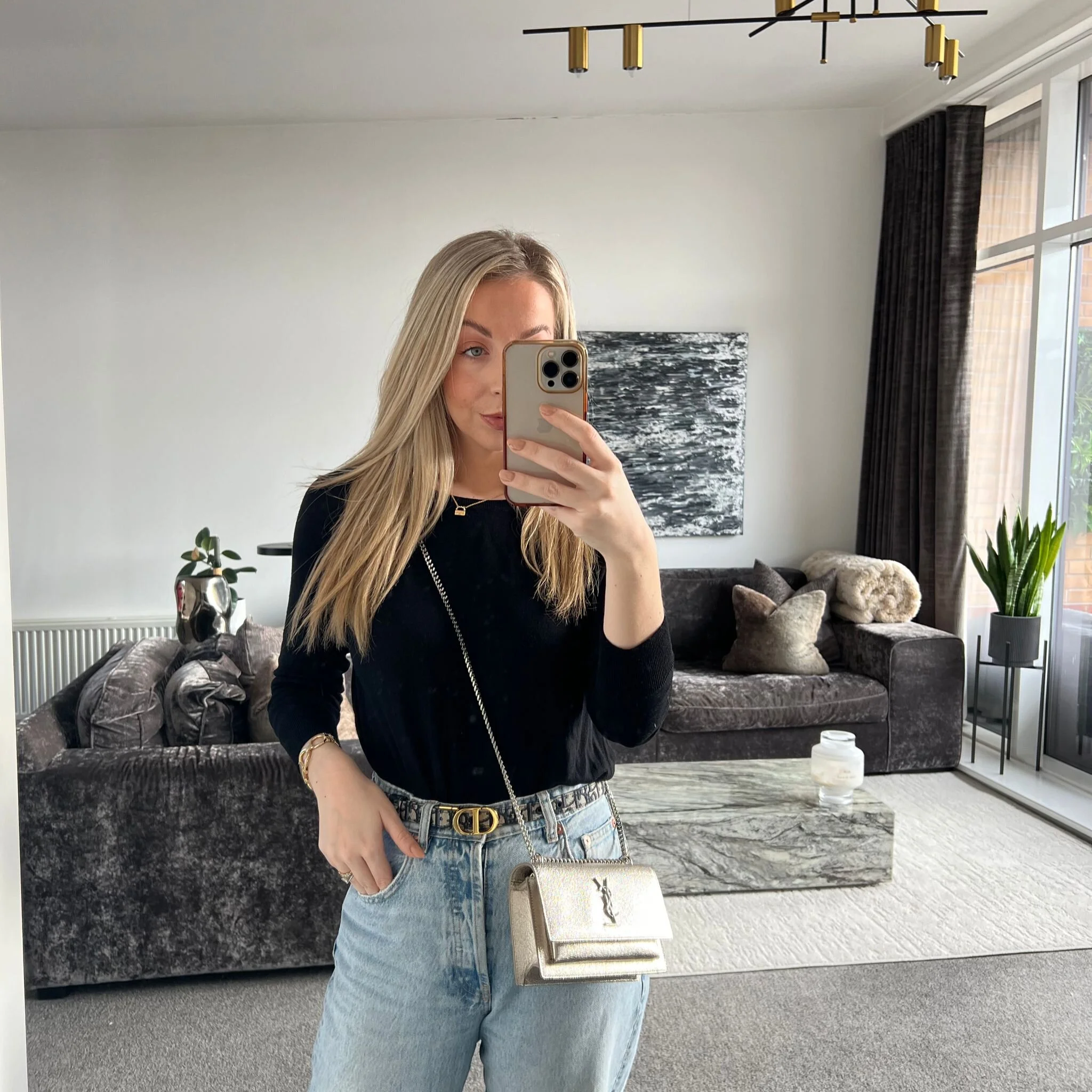 Saint Laurent YSL Sunset Wallet on Chain Bag in Silver Metallic shown on model