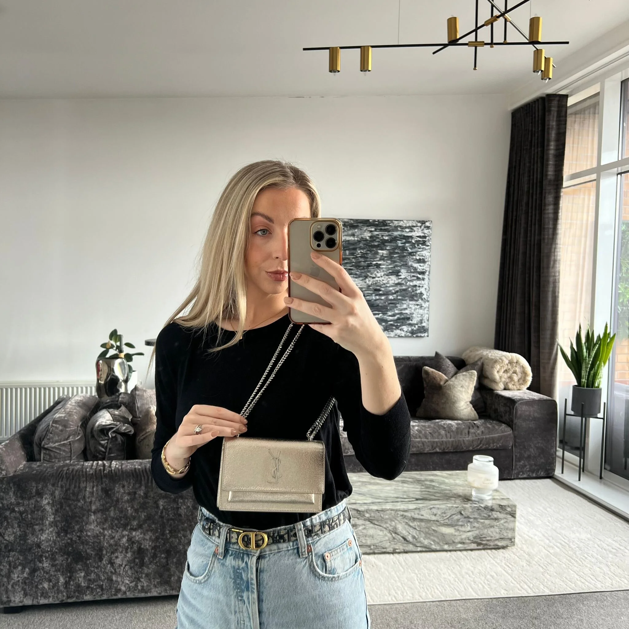 Saint Laurent YSL Sunset Wallet on Chain Bag in Silver Metallic shown on model