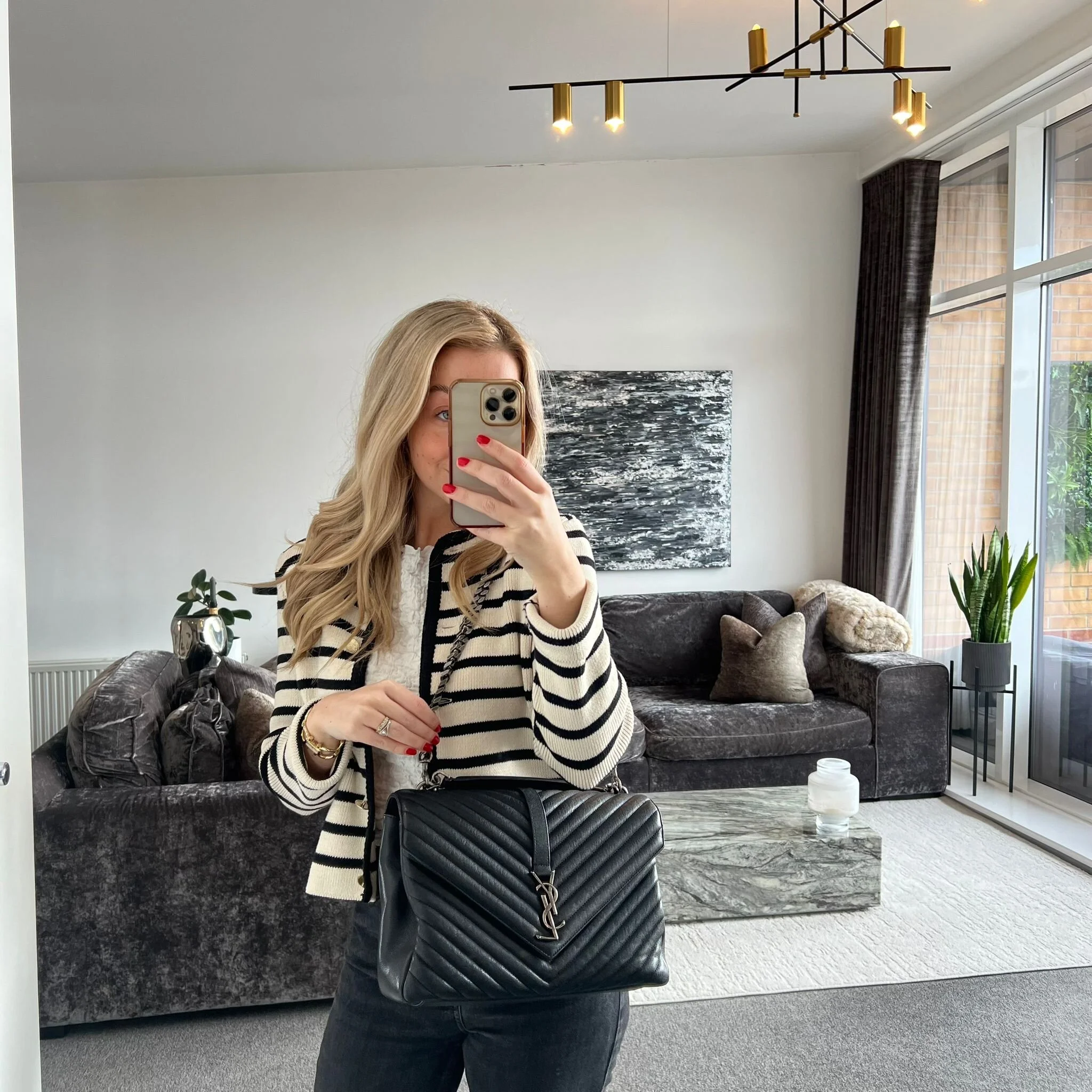 Saint Laurent YSL Large College bag in Black Quilted Leather and Silver Hardware shown on model