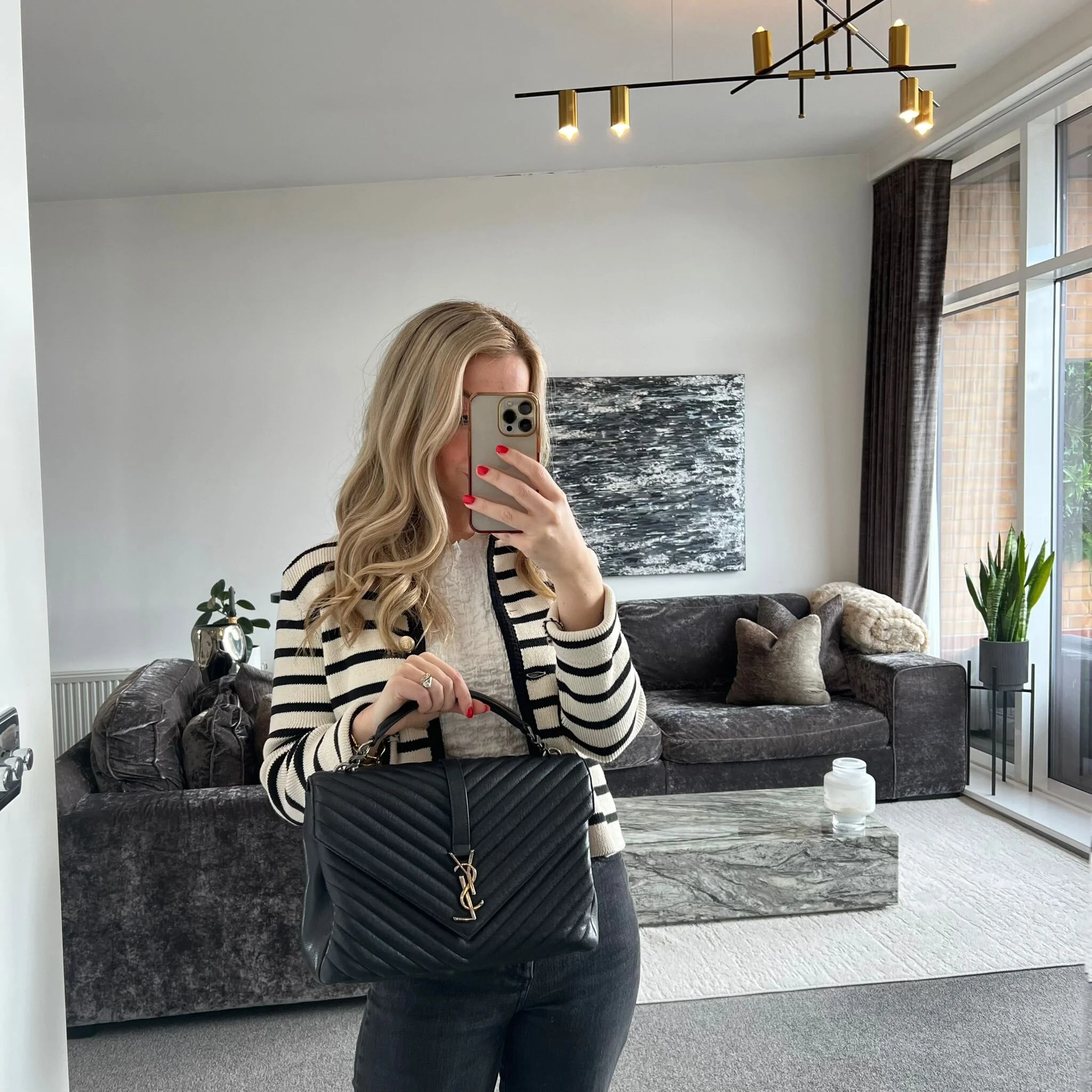 Saint Laurent YSL Large College bag in Black Quilted Leather and Silver Hardware shown on model