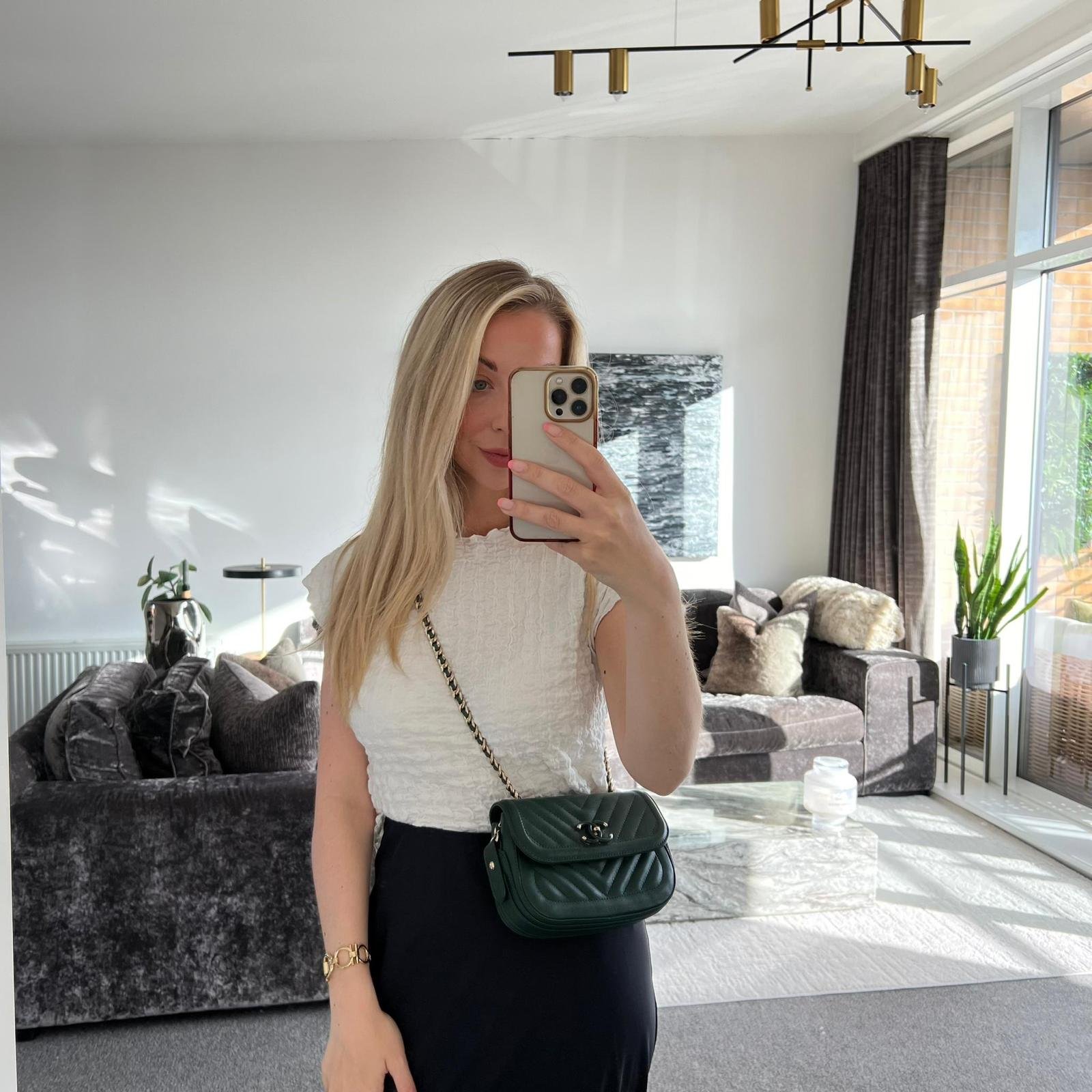 Chanel Chevron Quilted Green CC Mini Flap Bag shown on model
