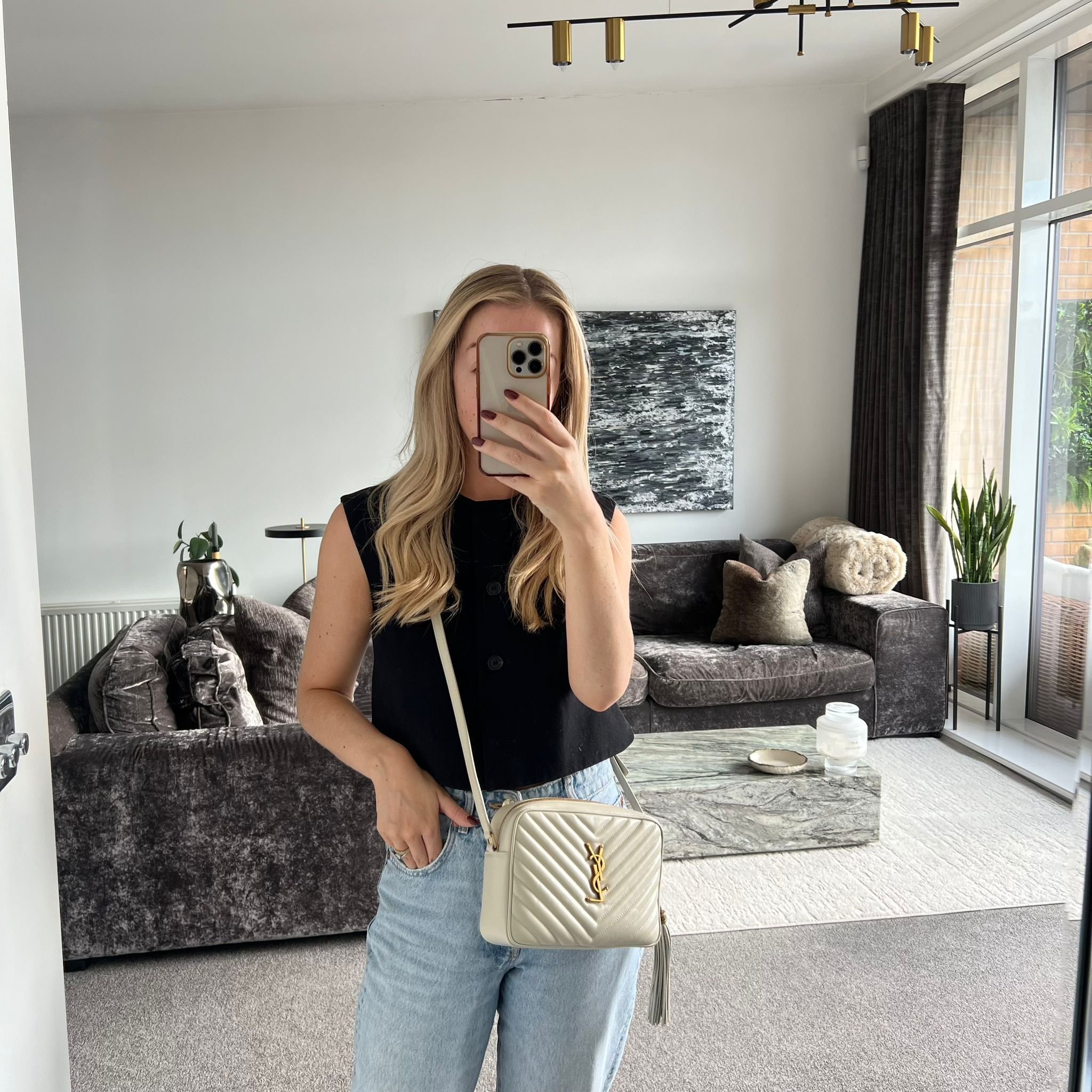 Saint Laurent YSL Camera Lou Bag in Quilted Cream Blanc Vintage on model