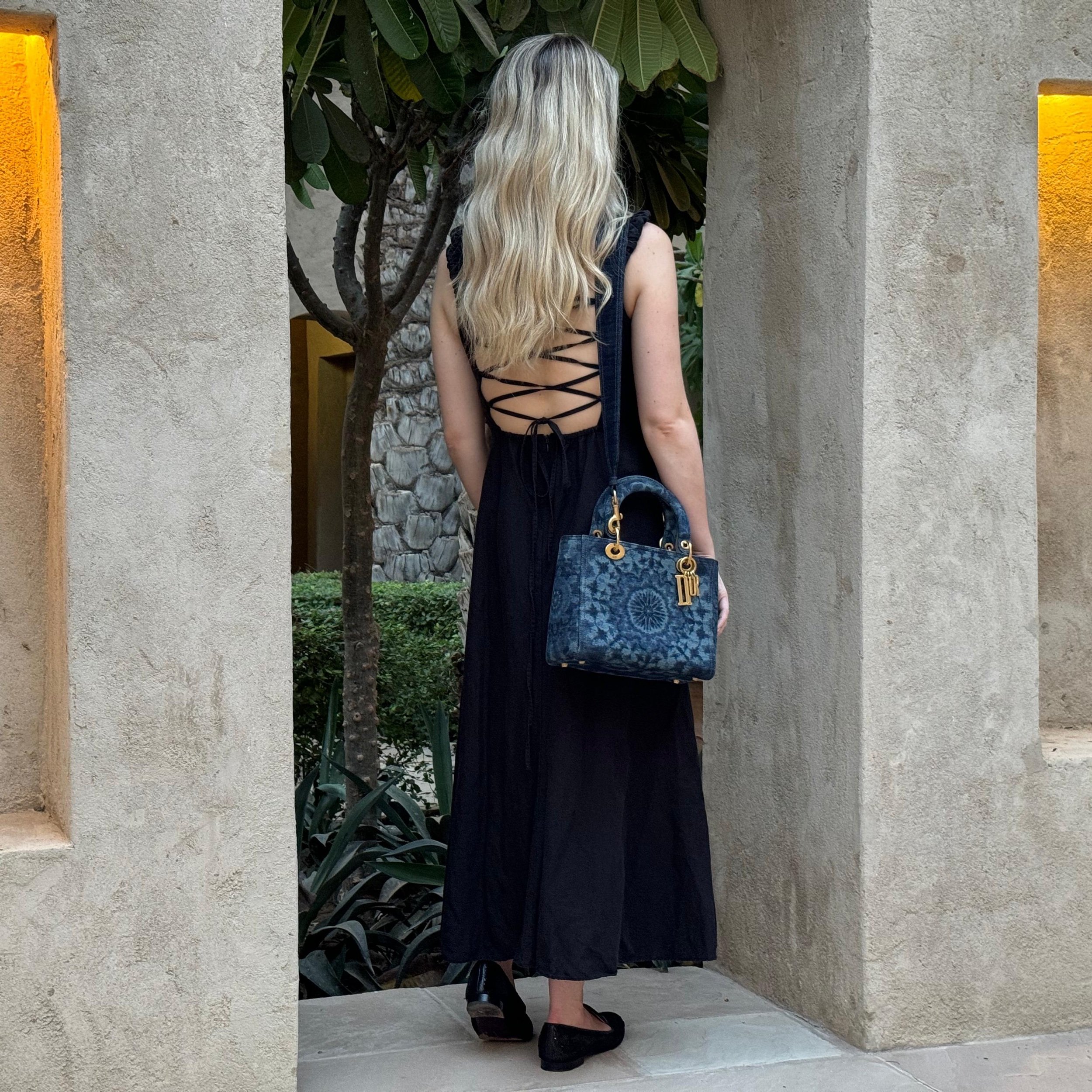 Lady Dior Medium Kaleidoscope Denim Bag with Aged Gold Hardware shown on model