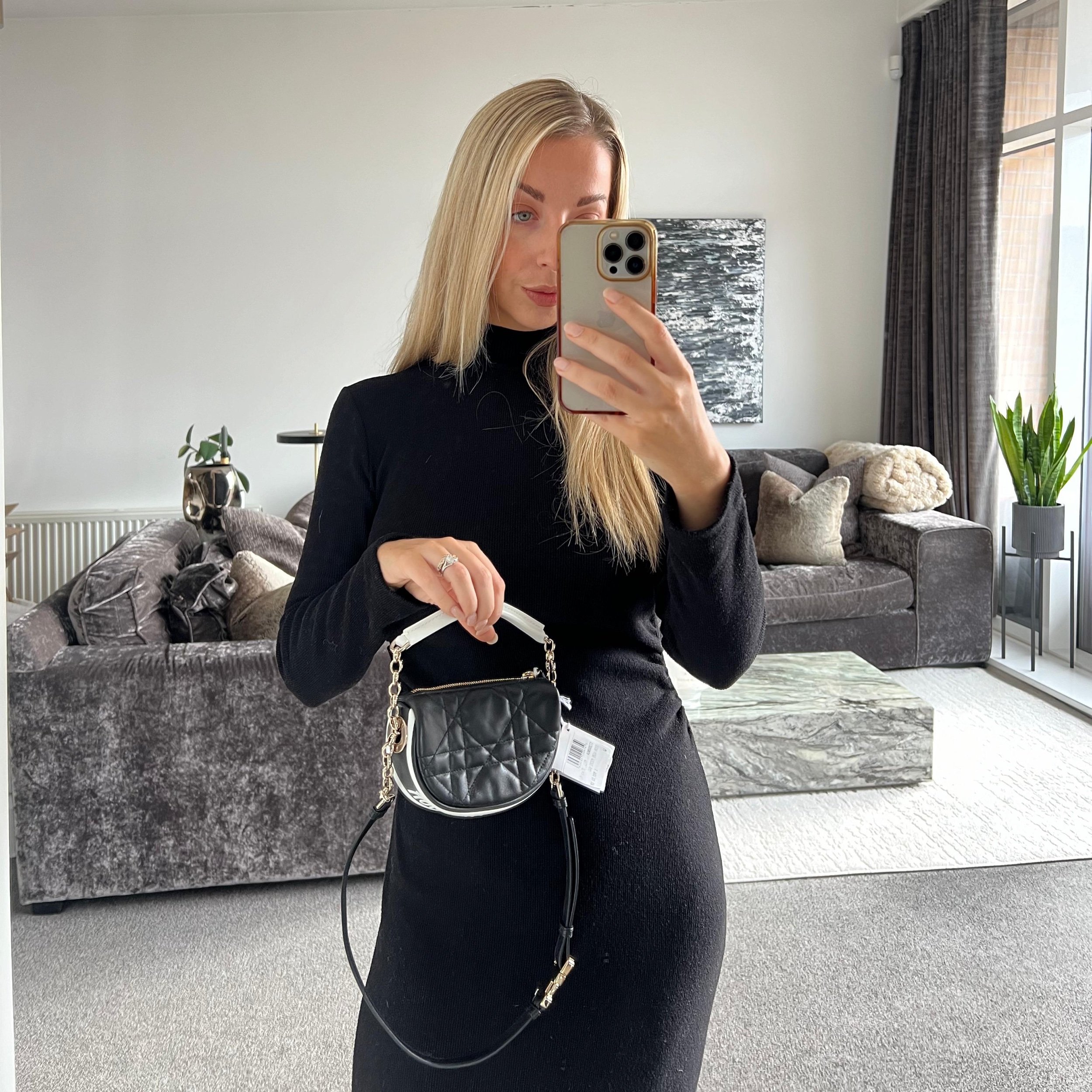 Dior Vibe Micro Bag Black and White with Gold Hardware shown on model