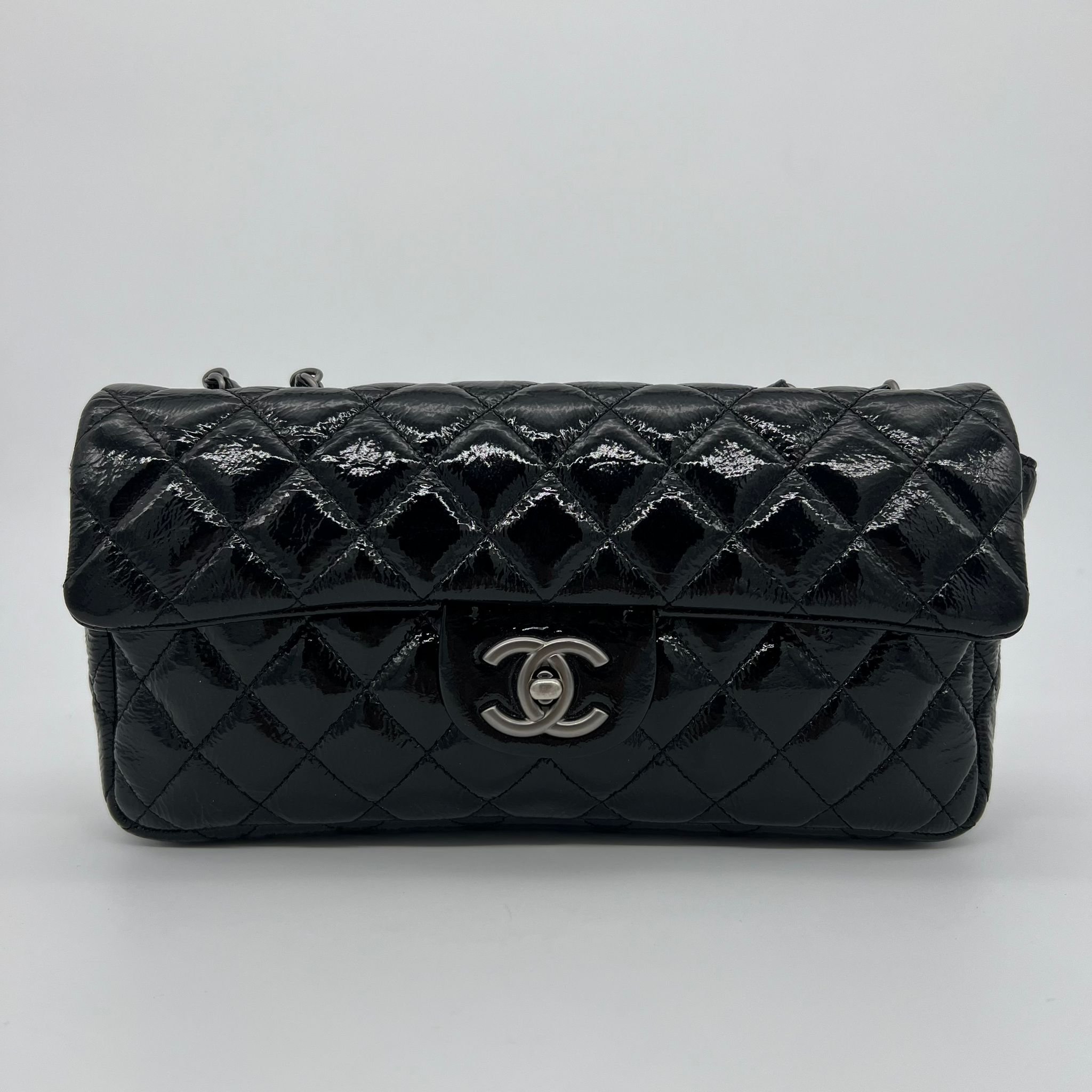 Chanel Quilted East West Flap Bag in Black Distressed Patent leather front