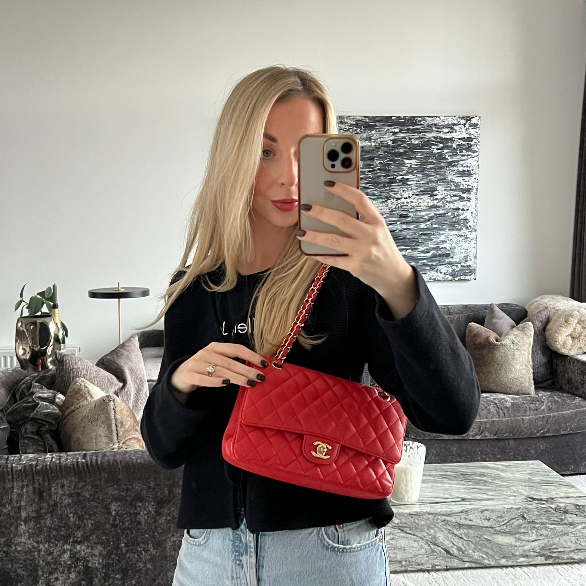 Chanel Medium Double Classic Flap Red Caviar Leather Gold Hardware shown on model