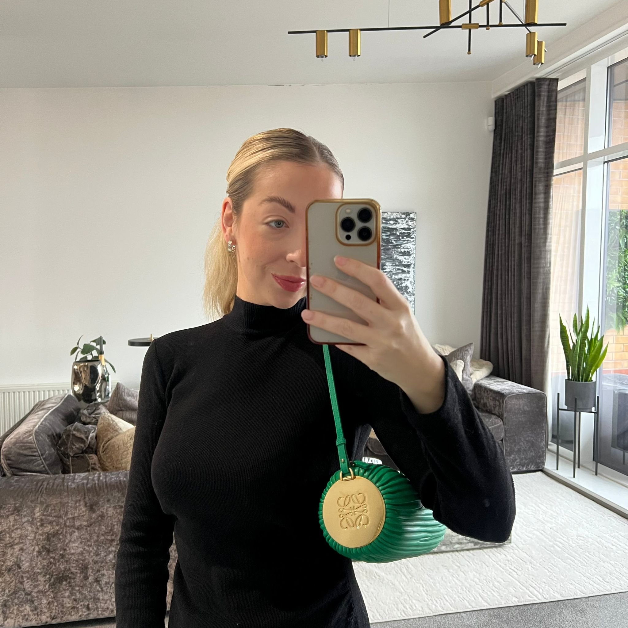 Loewe Bracelet Pouch Shoulder Bag in Green Pleated Lambskin Leather on model