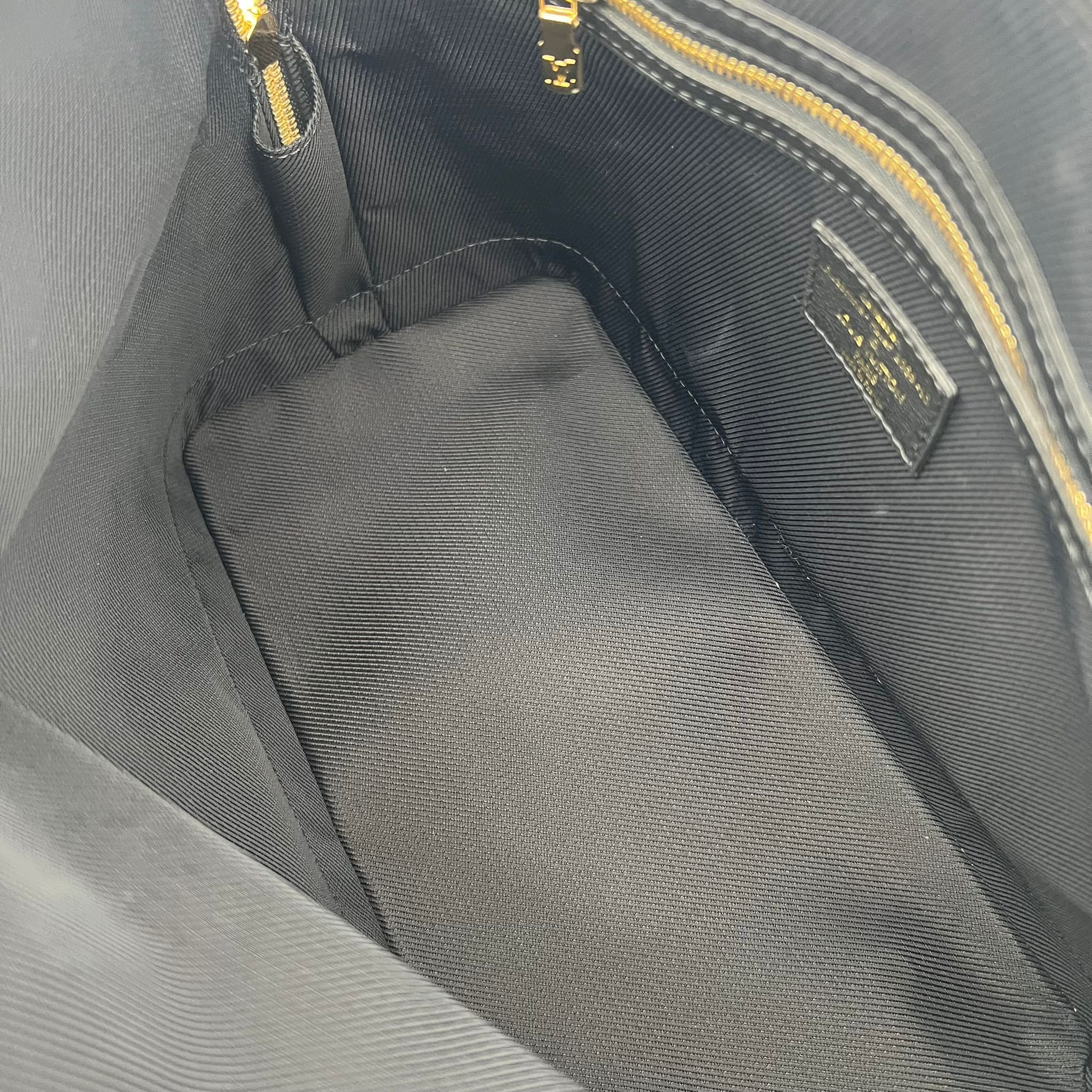 Louis Vuitton Double Jeu Neo Alma Bag Limited Edition Blue Monogram interior
