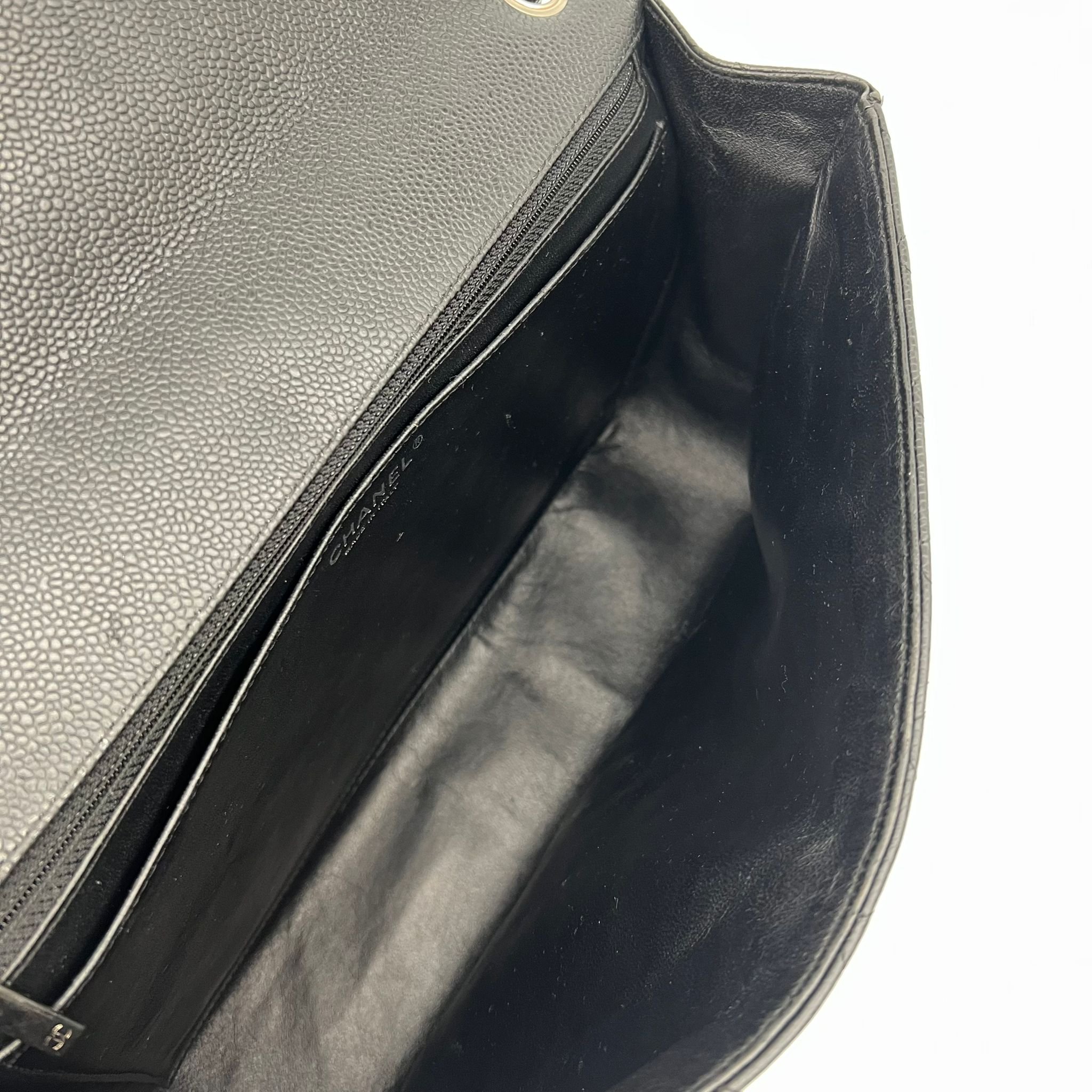 Chanel Classic Maxi Flap Bag Black Caviar Leather Silver Hardware interior
