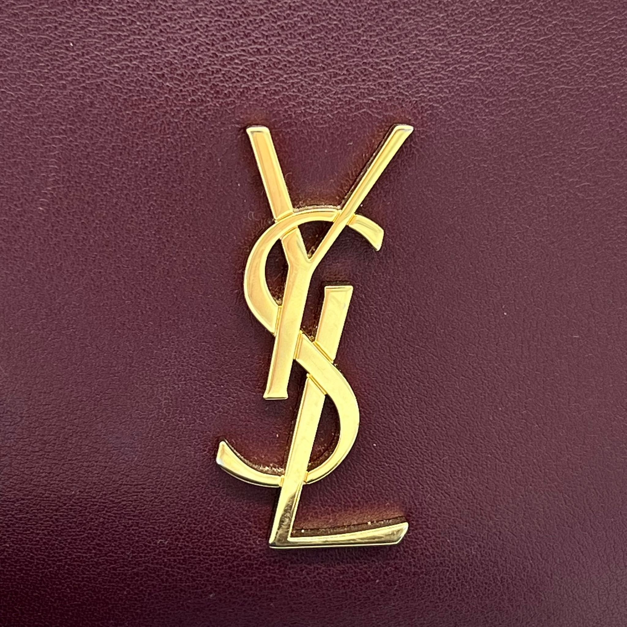 Saint Laurent YSL Blogger Bag in Rouge Legion Burgundy Gold Hardware close up hardware