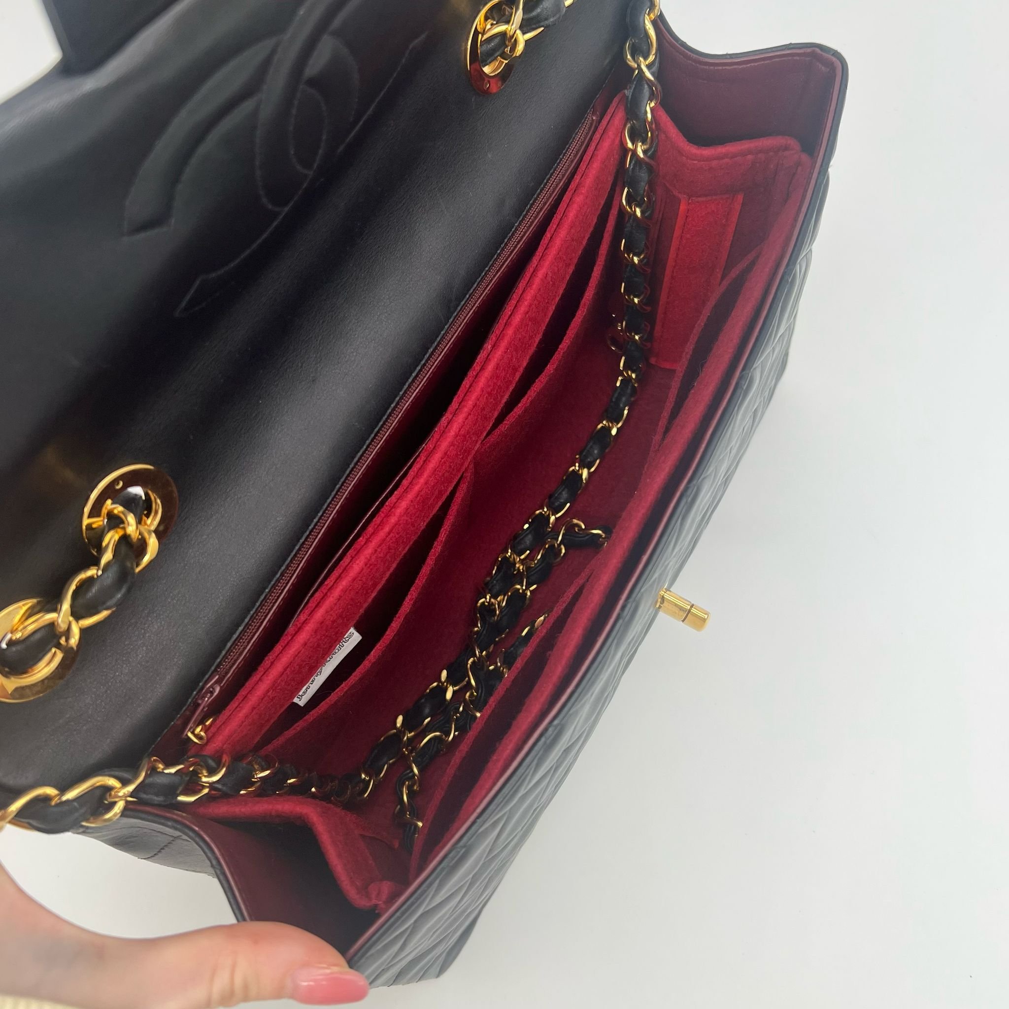 Chanel Maxi XL Jumbo Flap Bag in Black Lambskin with 24K Gold Hardware with liner