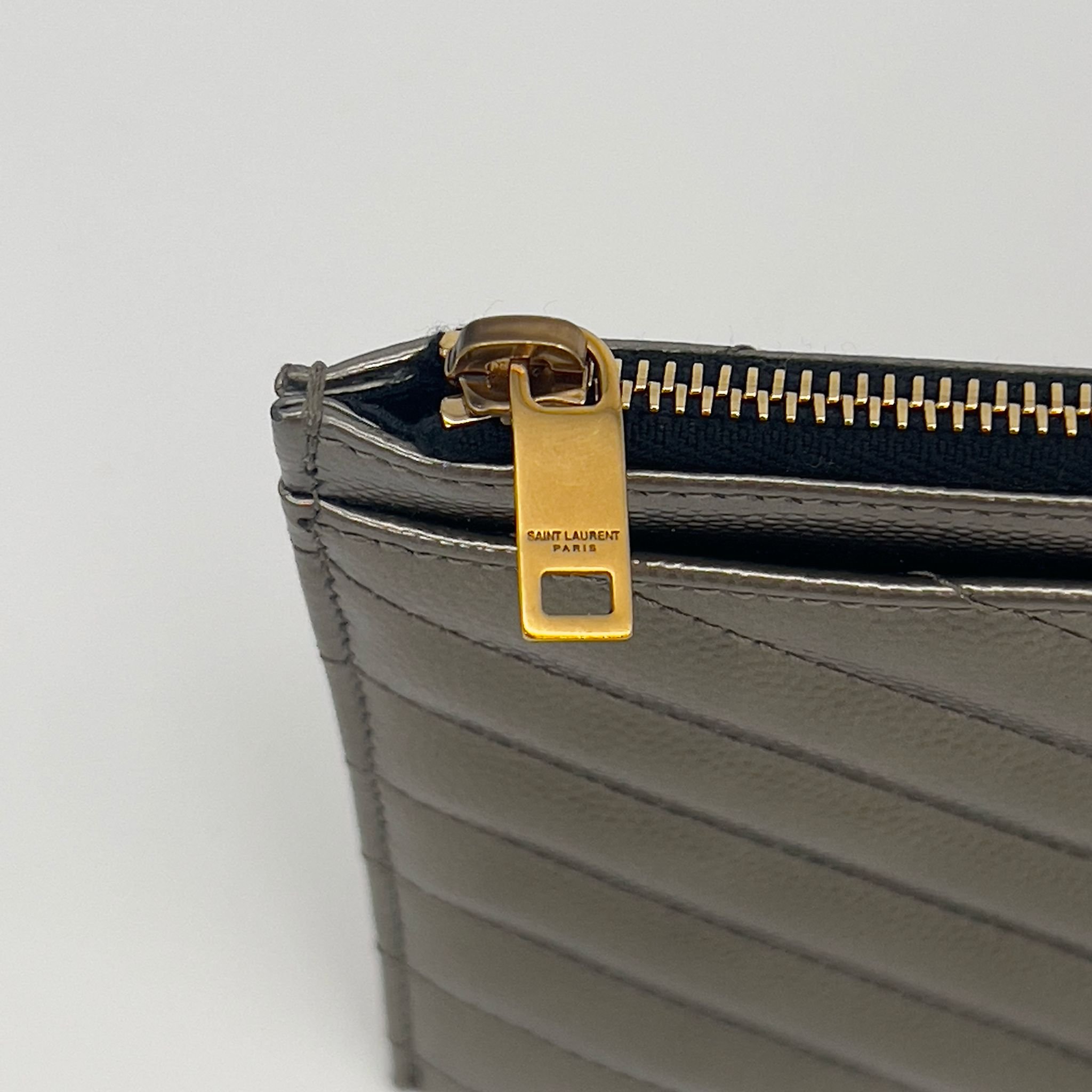 Saint Laurent YSL Cassandre Pouch Clutch Metallic Leather Gold Hardware zip
