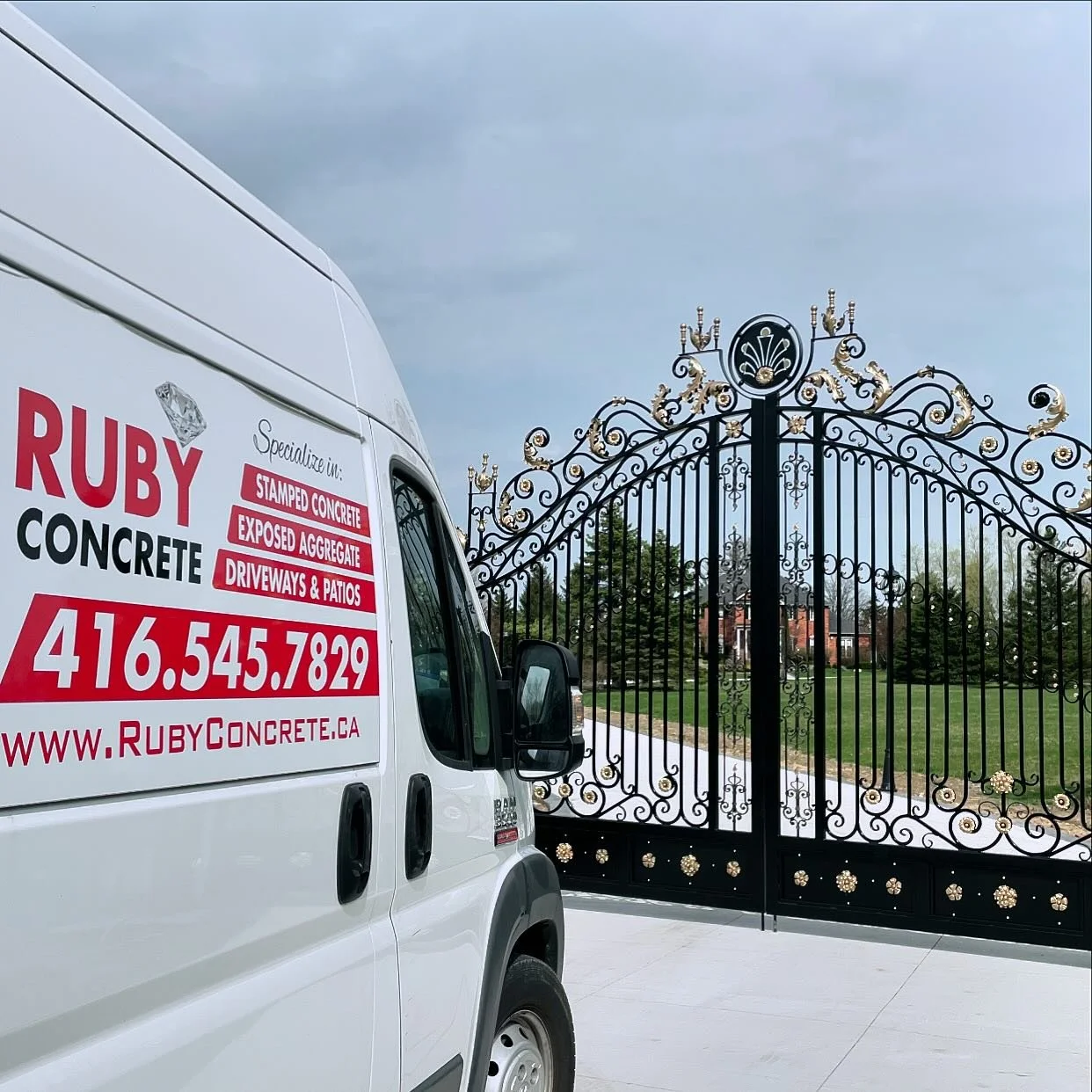 The entrance to this amazing record length driveway done with a charcoal border on both sides!