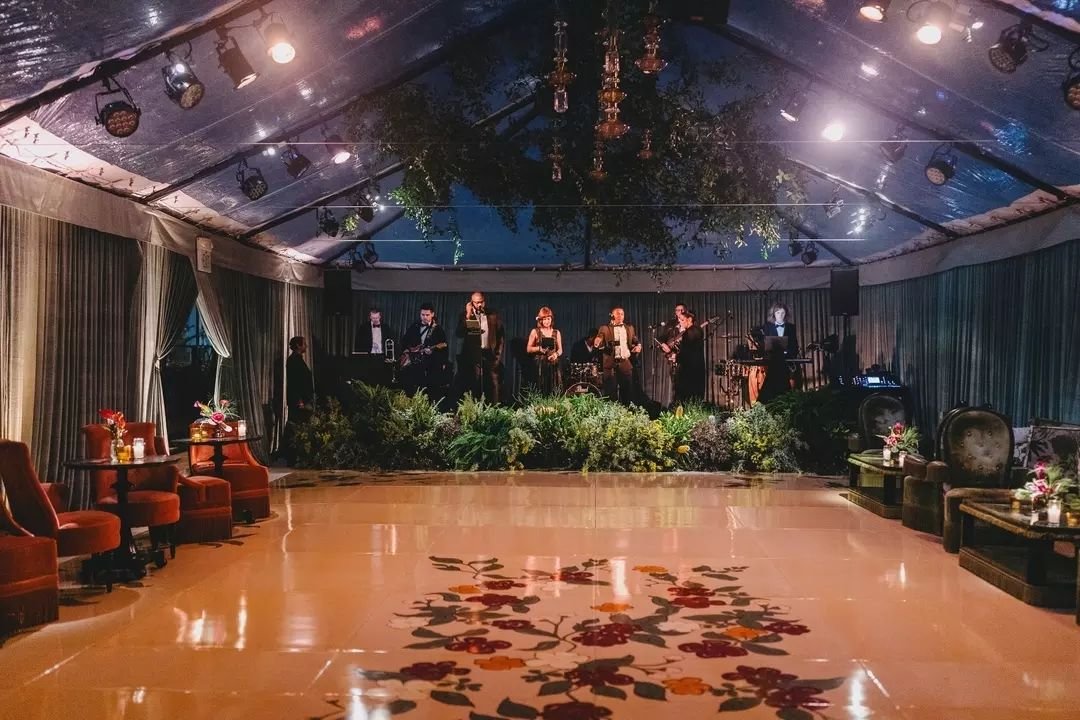 What a night! After a gorgeous wedding on two floors of the Hotel Perla, the guests moved to a tent off the hotel for the afterparty. The hand-painted dance floor was packed as the band Everyday People from West Coast music took to the stage with sou