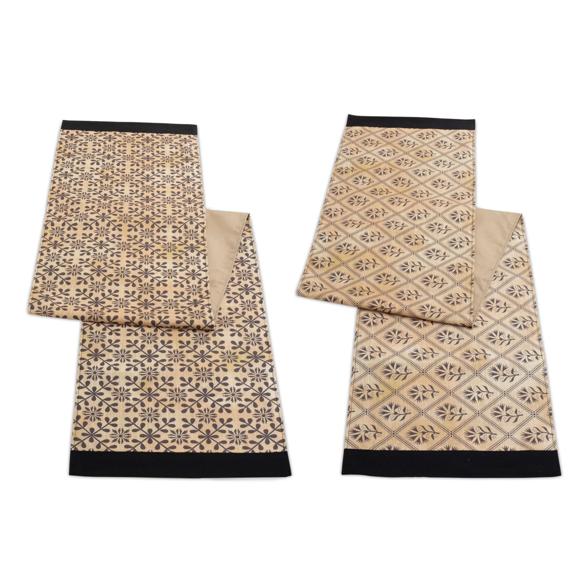 Black and gold geometric floral table runner set displayed on dining table