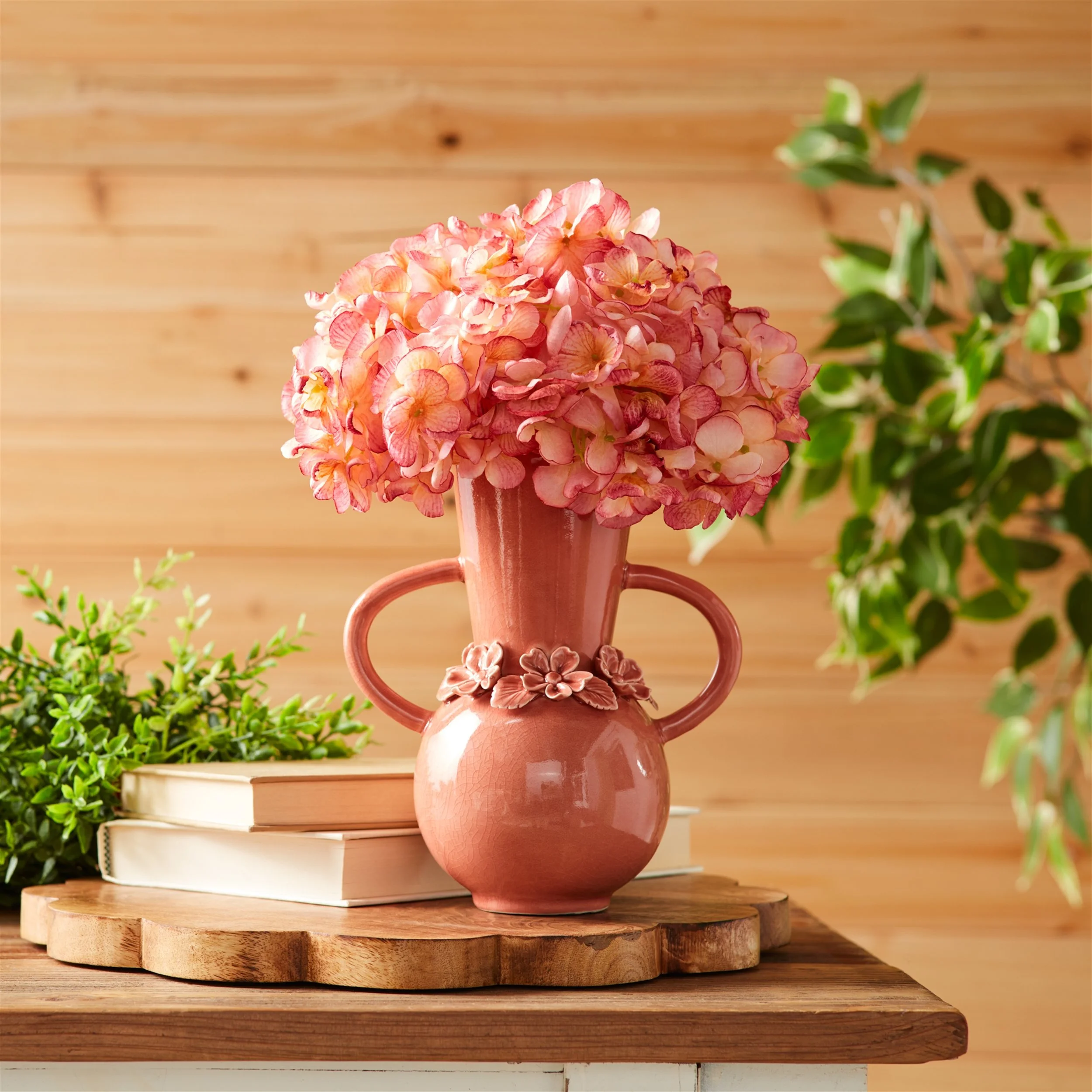 mauve-pink-stoneware-floral-accent-vase-set-of-2-lifestyle-image-with-person.jpg