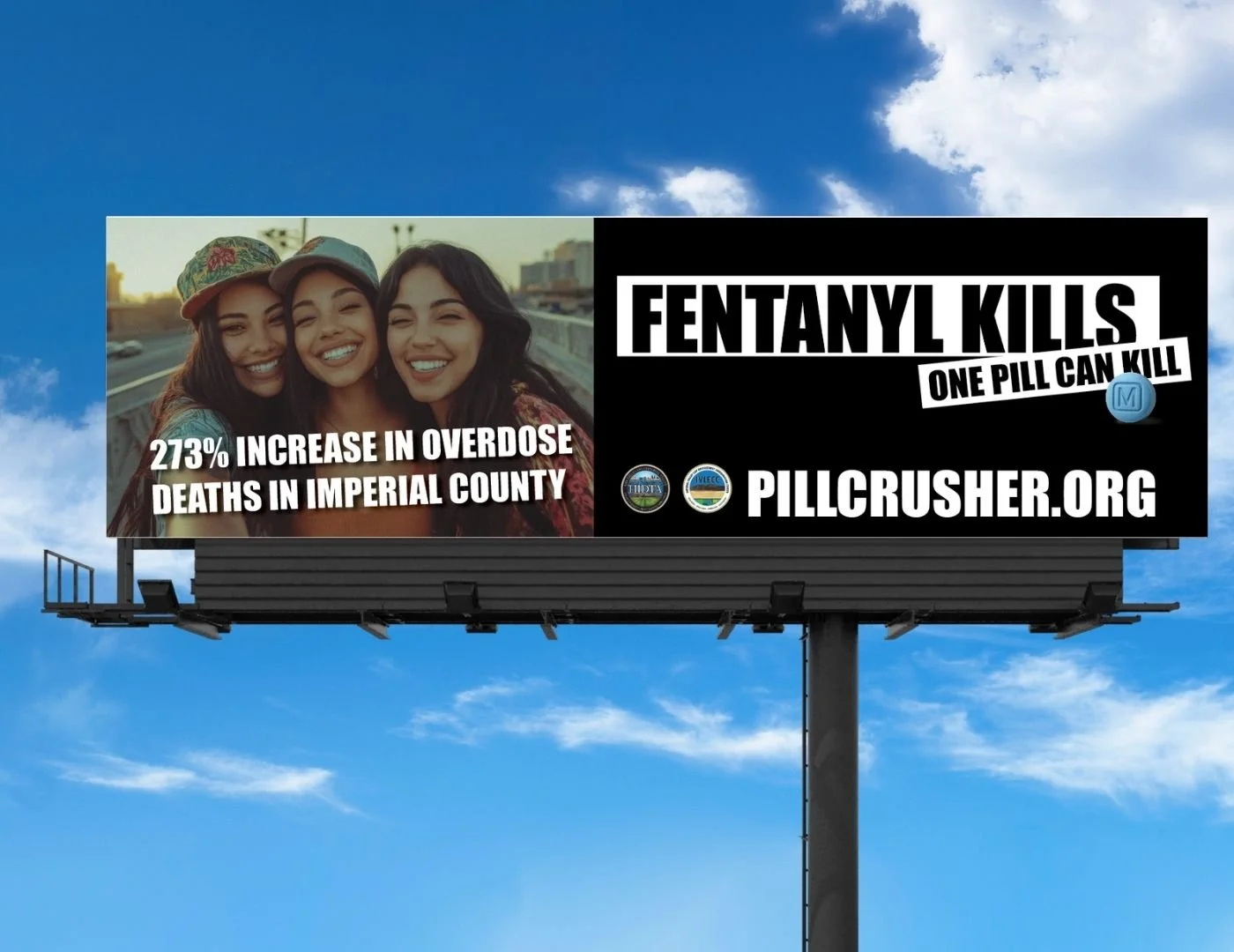 Billboard with a photo of three smiling women and a message about fentanyl being lethal, highlighting a 273% increase in overdose deaths in Imperial County, and promoting pillcrusher.org.