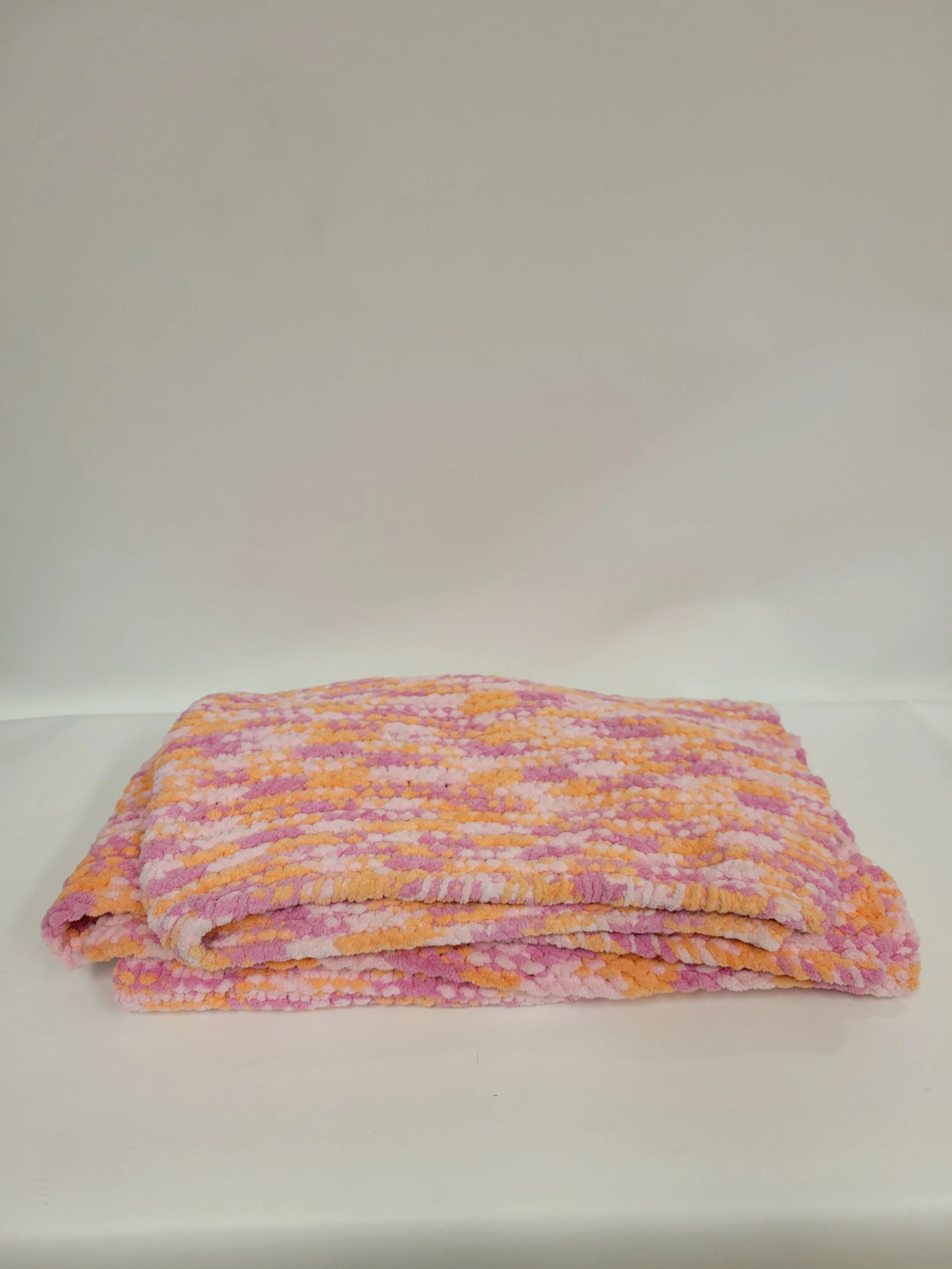 Couverture tricoté main, rose et orange