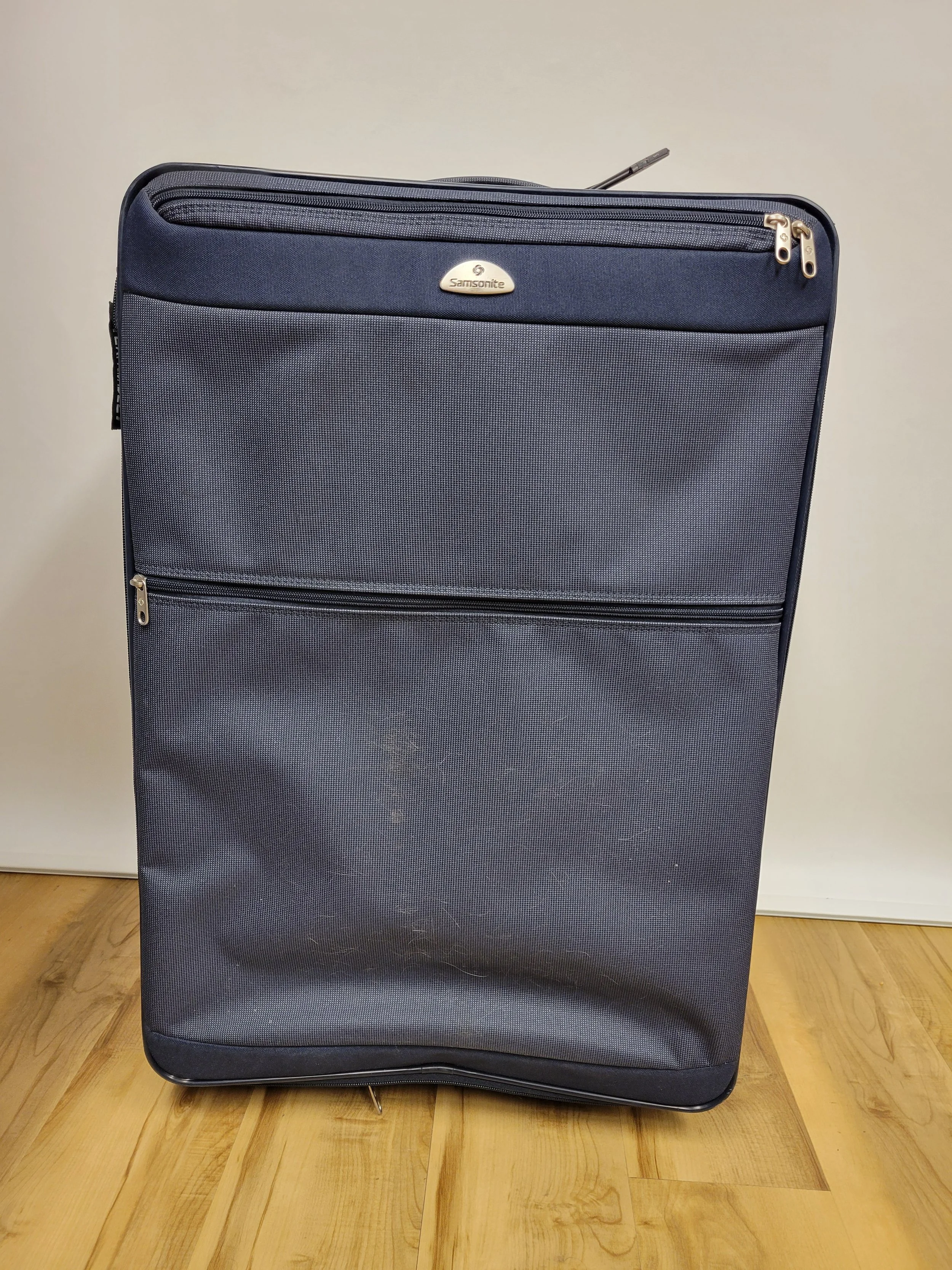 Grande valise marine, Samsonite, 18 x 10 x 28 po (un peu d'usure)