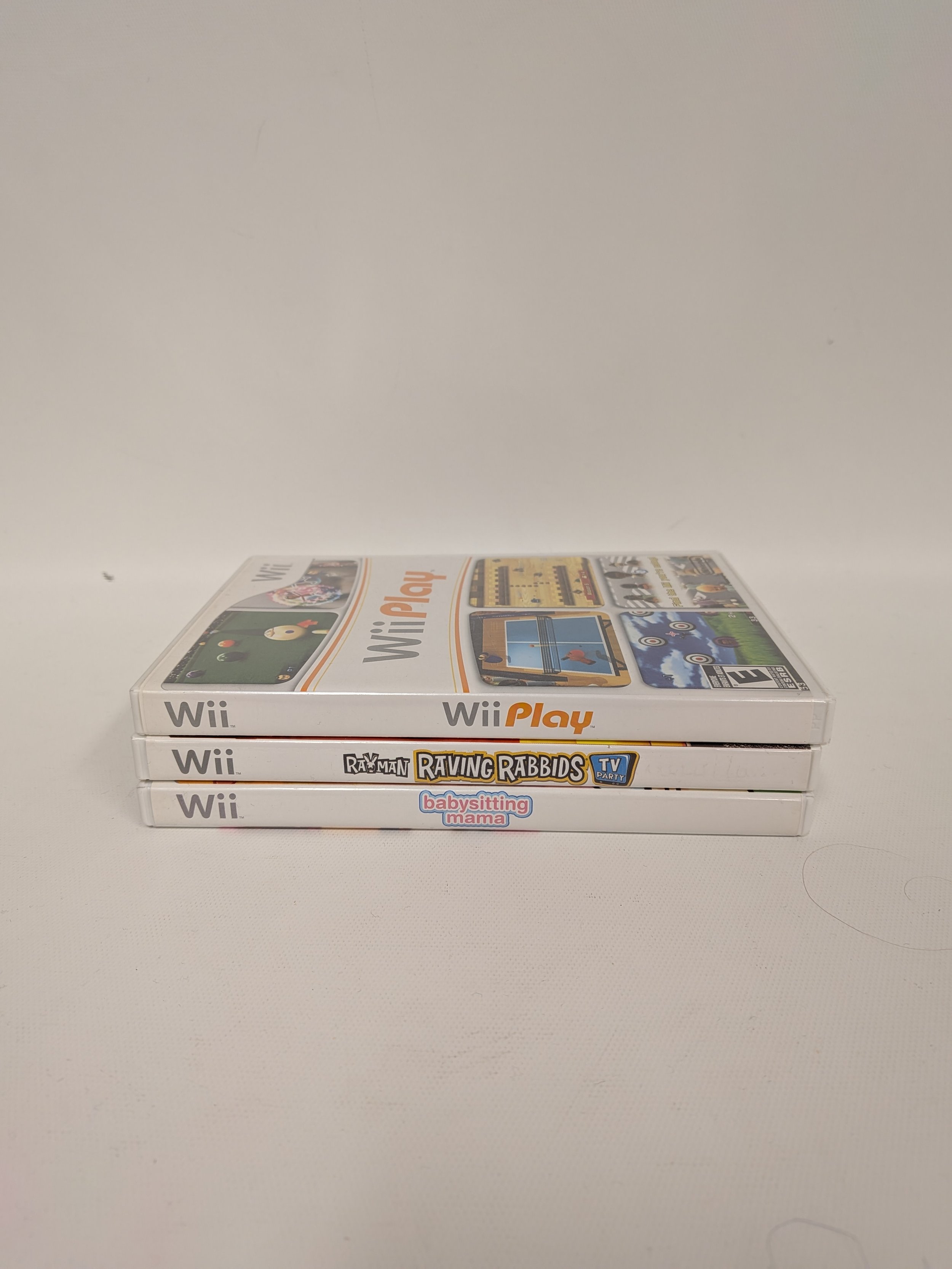 3 jeux de Wii: Wii Play, Rayman Raving Rabbids, Babysitting Mama