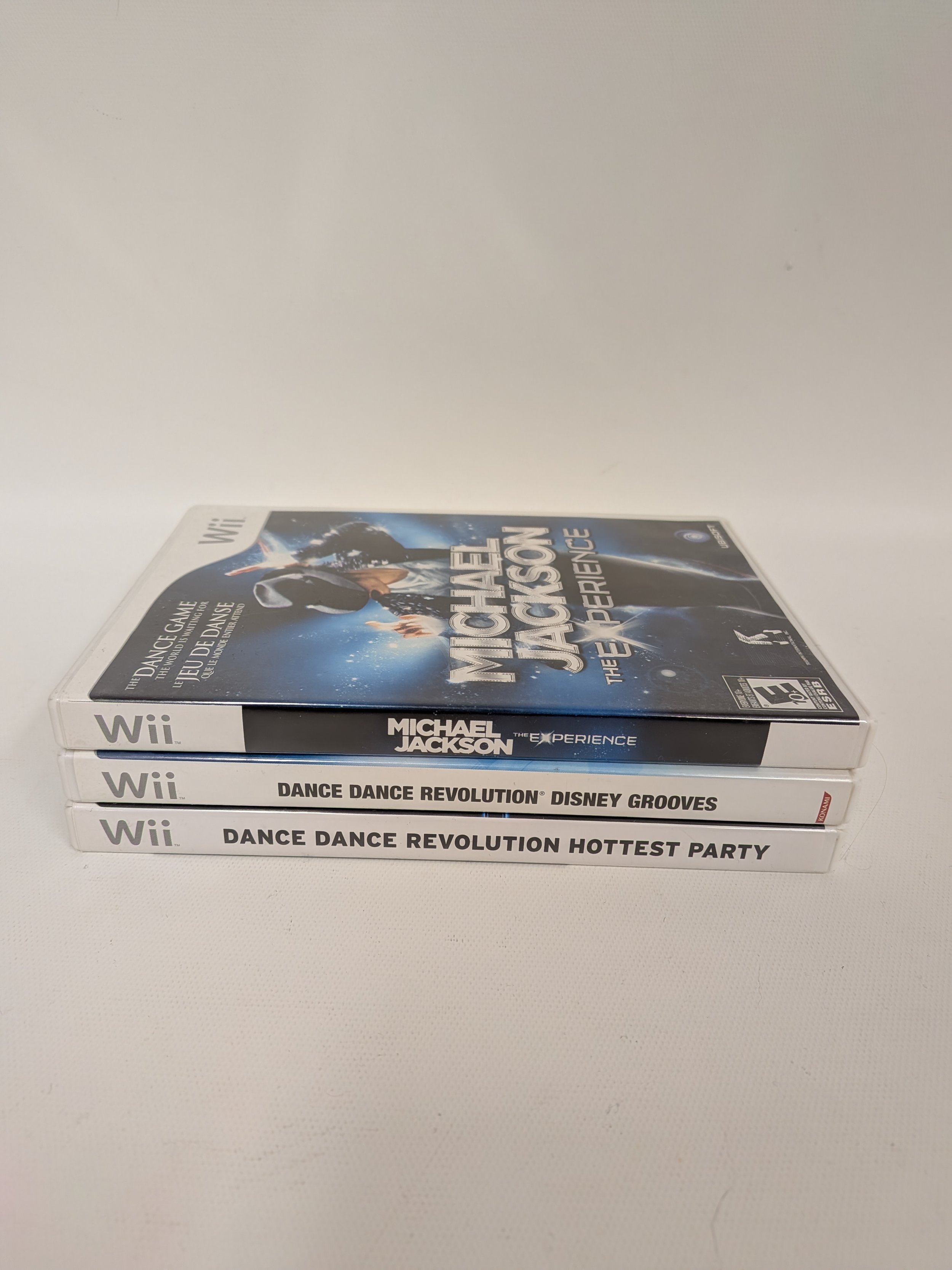 3 jeux de Wii: DDR Hottest Party et Disney Groove, Micheal Jackson Experience