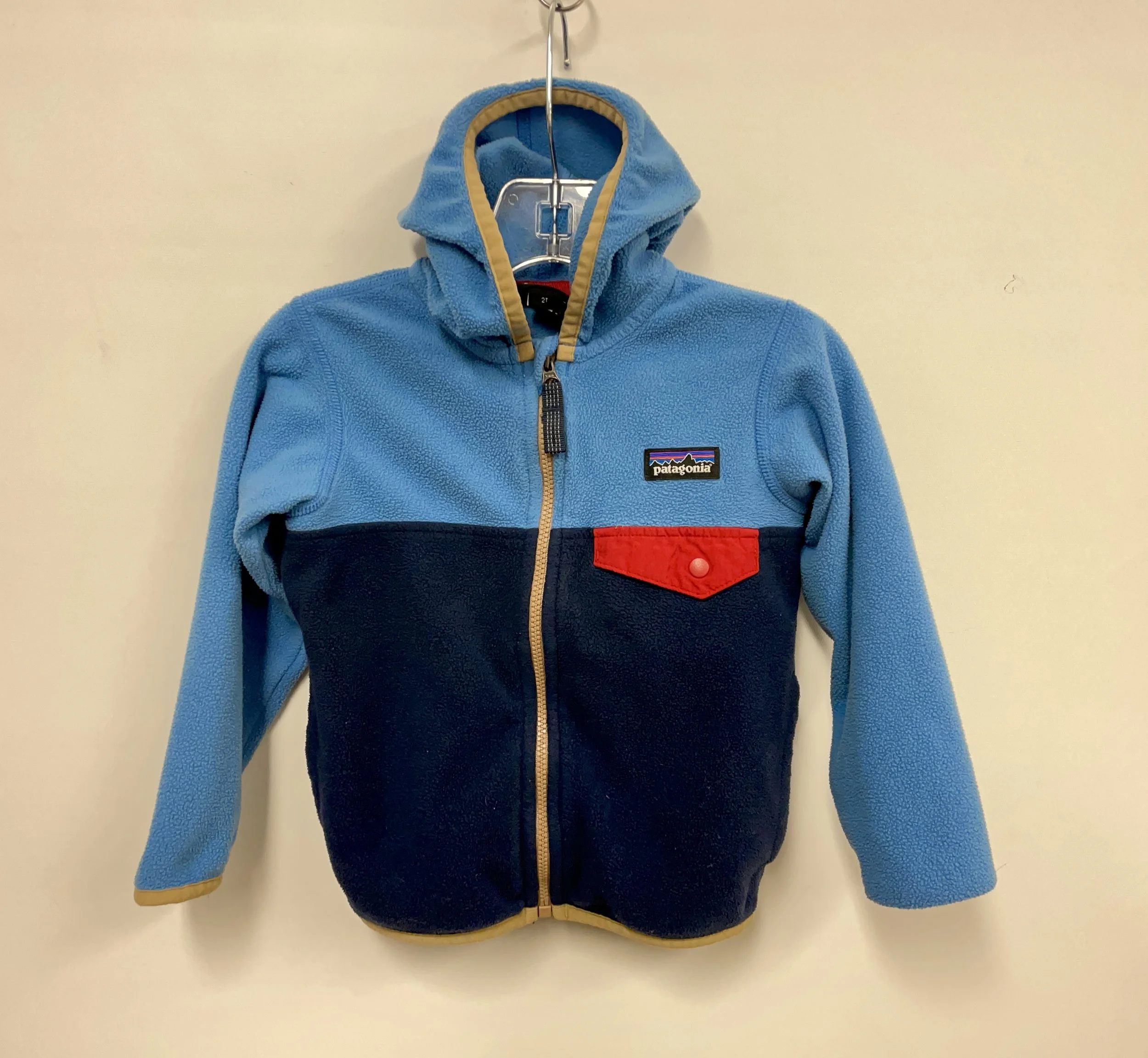 Polar bleu pâle et marine avec capuchon, PATAGONIA, taille 2 ans.