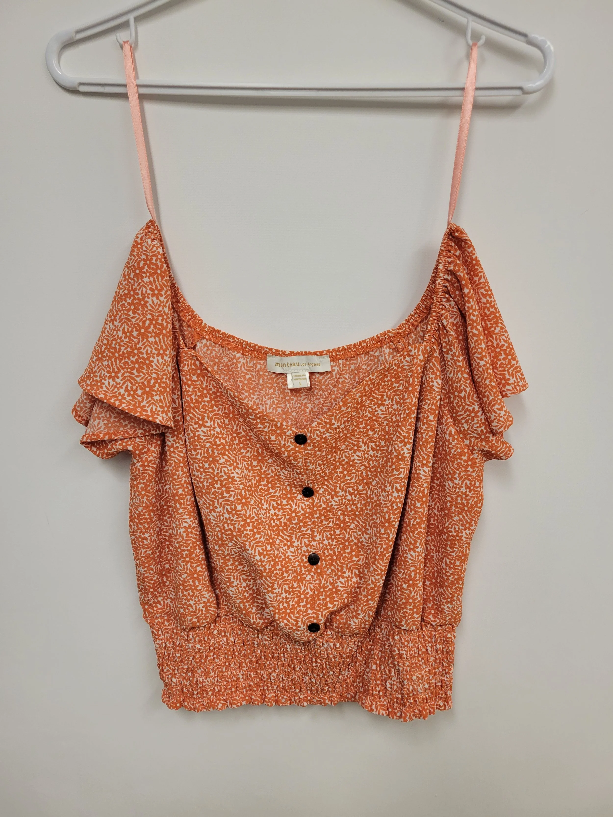 Haut Fleuri orange, Monteau, L