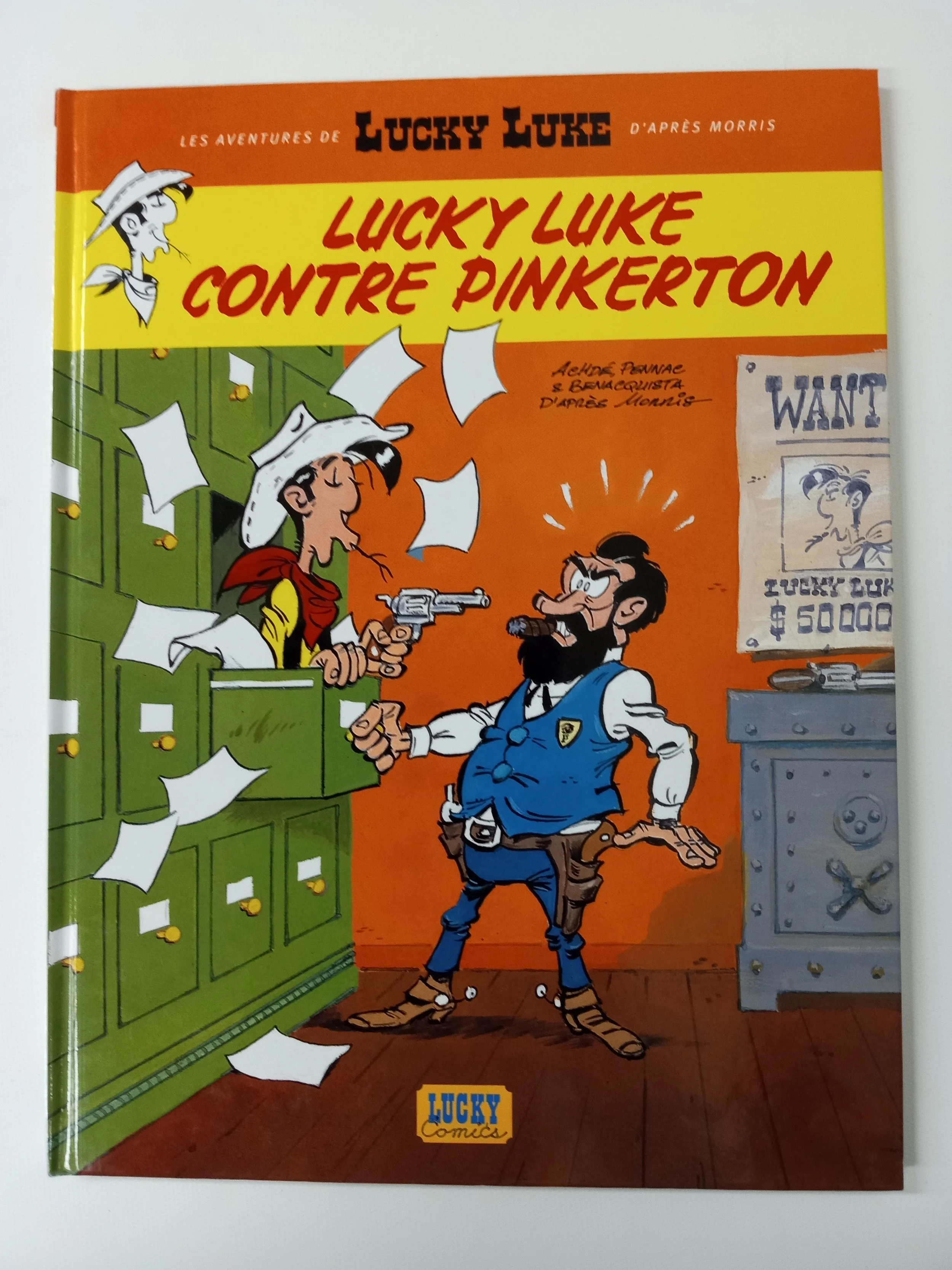 Lucky Luke contre Pinkerton, Les aventures de Lucky Luke d'après Morris, Achdé, Pennac et Benacquista, Éditions Lucky Comics, 46 p.