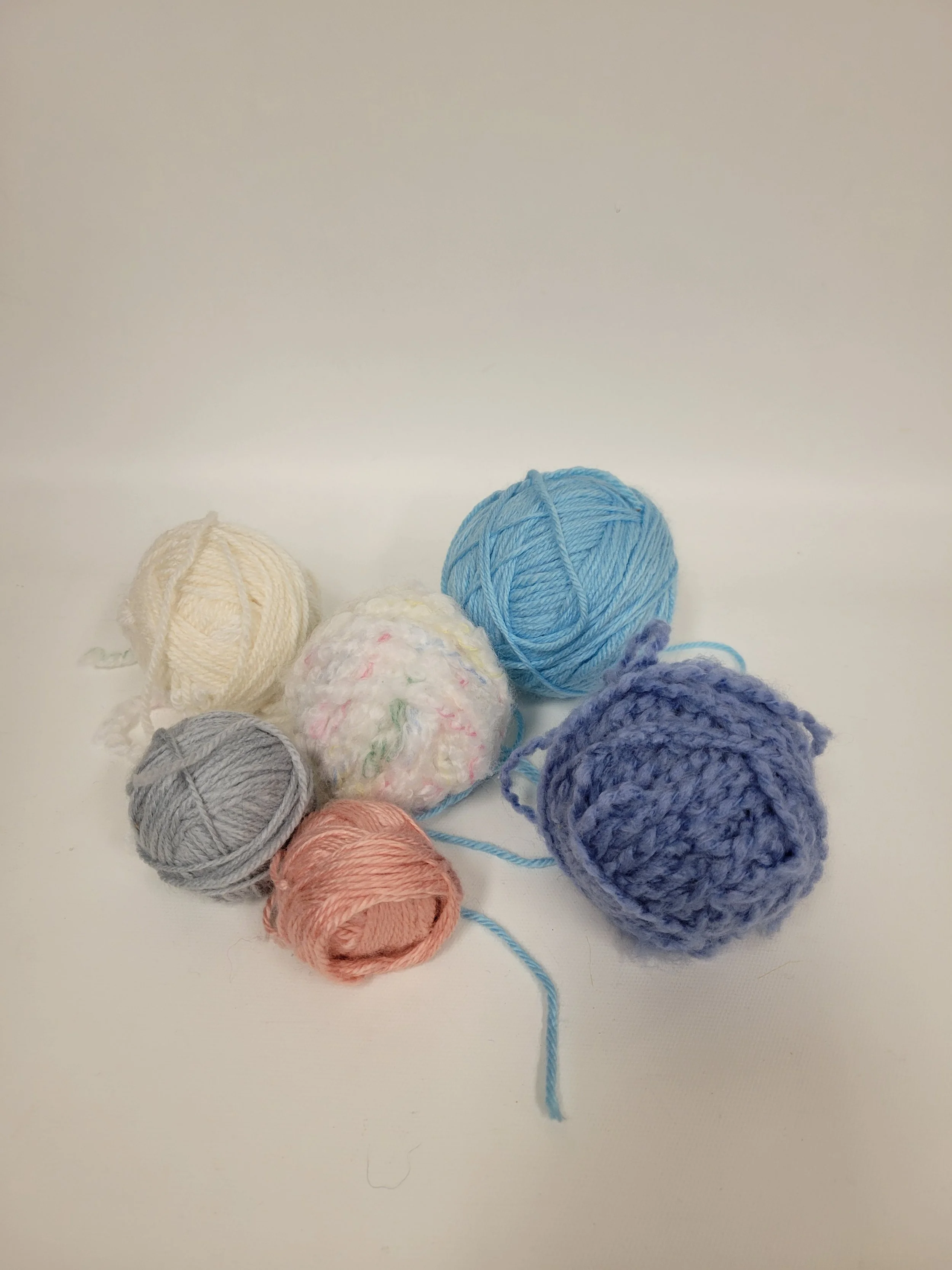 Balles de laine couleurs pastel