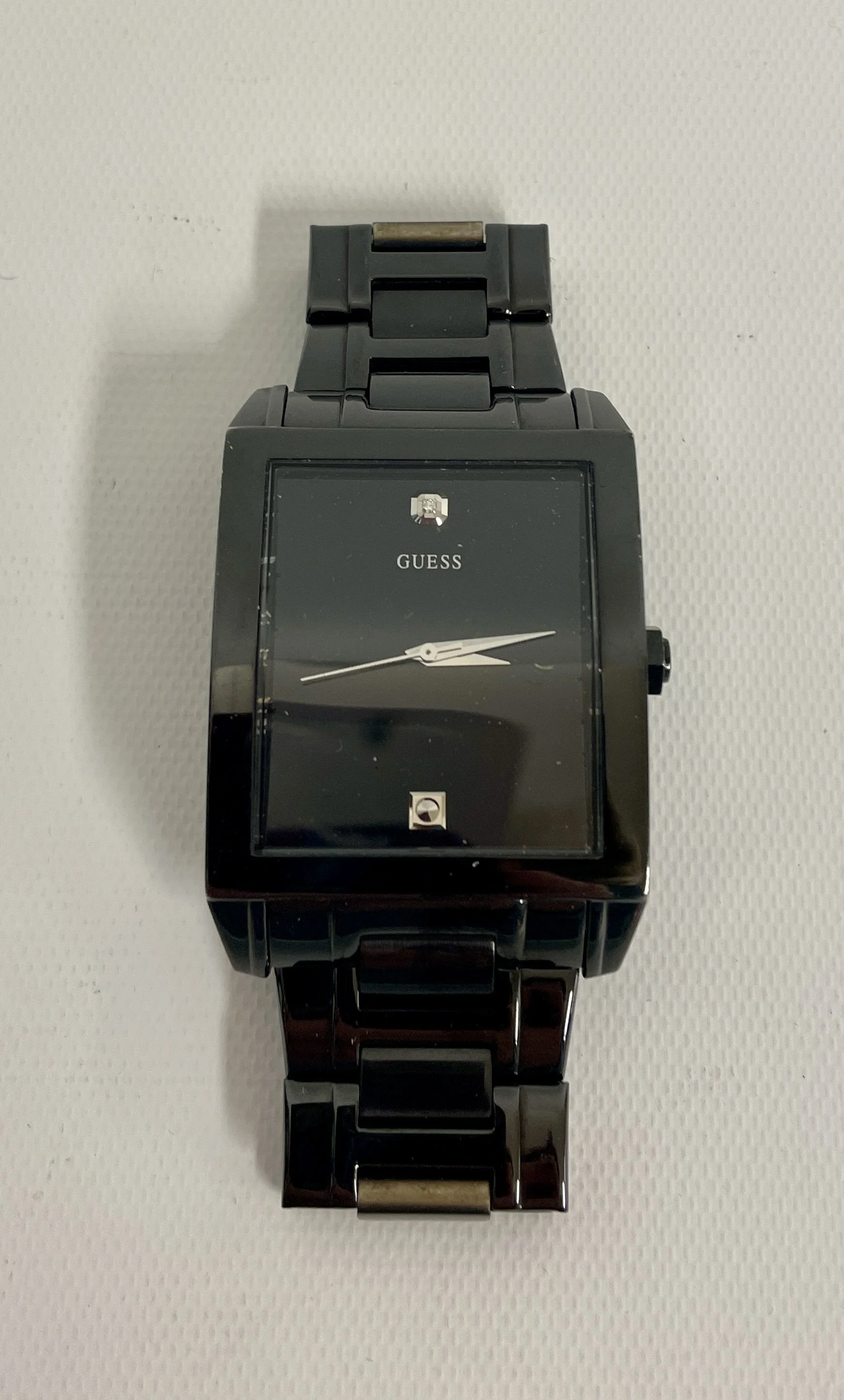 Montre noire GUESS, bracelet métallique, comme neuve (piles neuves)