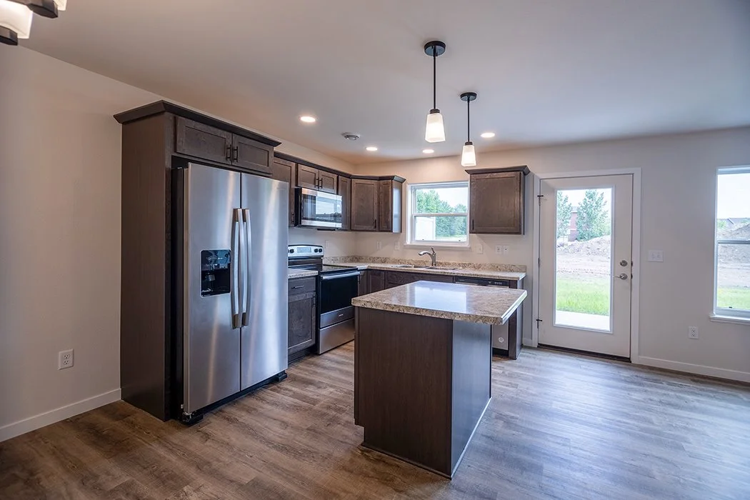Canyon 2 Townhome full kitchen with door