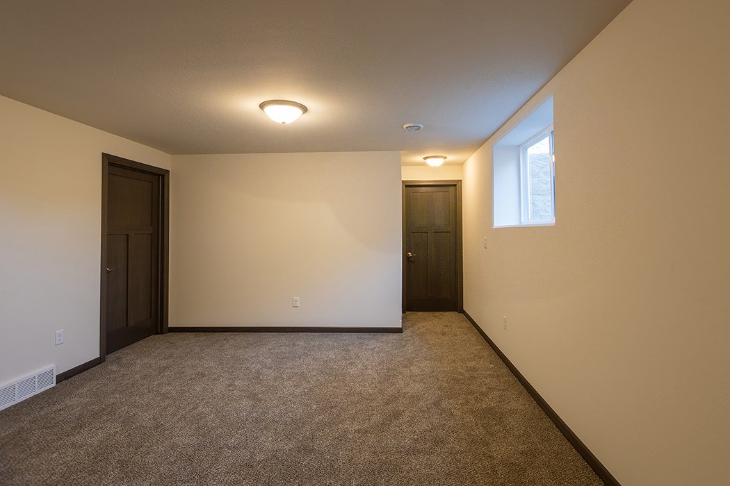 Lily G2 lower level family room view towards stairs